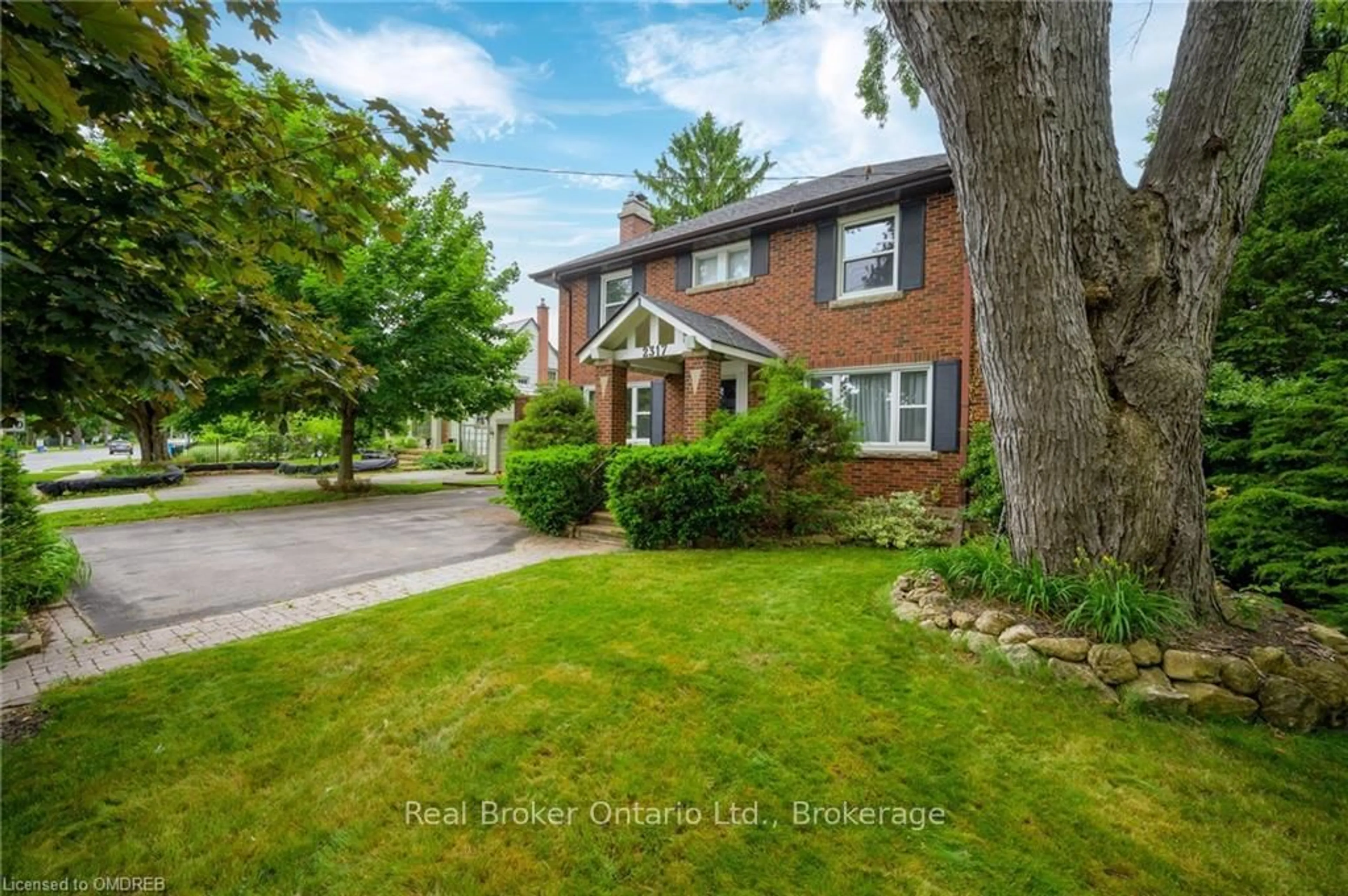 Home with brick exterior material, street for 2317 Lakeshore Rd, Burlington Ontario L7R 1B3