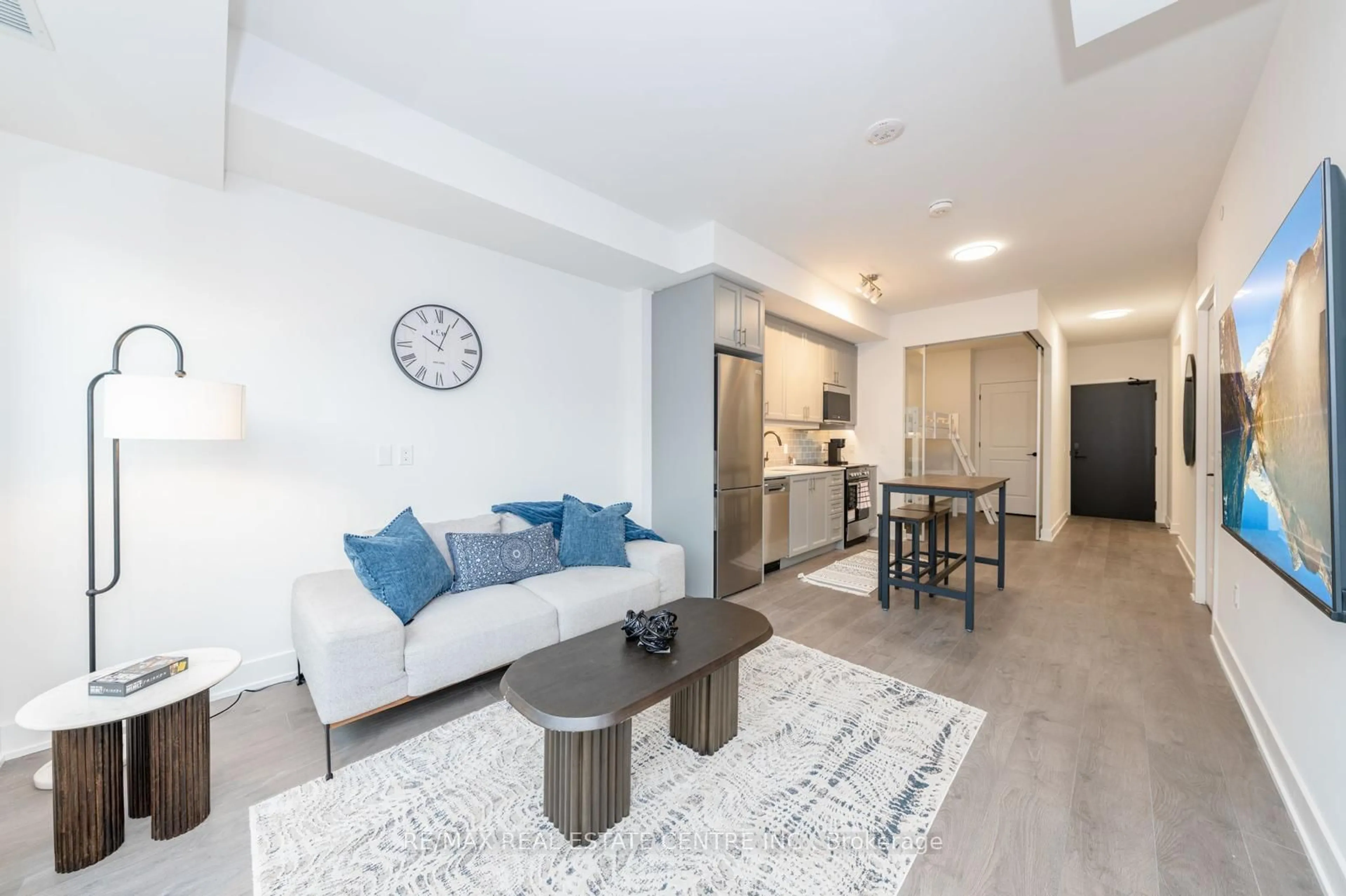 Living room with furniture, unknown for 2343 Khalsa Gate #313, Oakville Ontario L6M 4J2