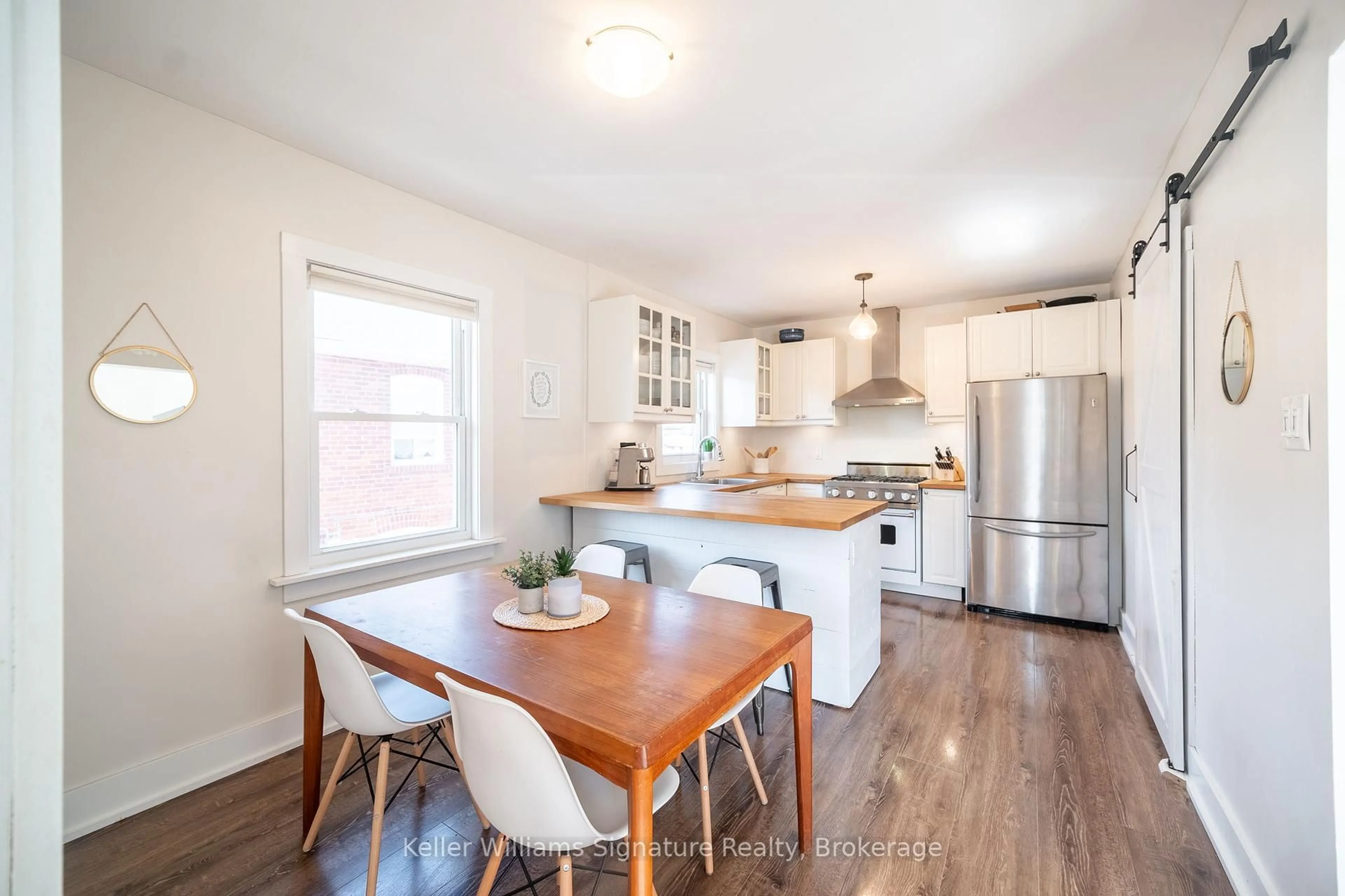 Open concept kitchen, wood/laminate floor for 367 Bartos Dr, Oakville Ontario L6K 3E5