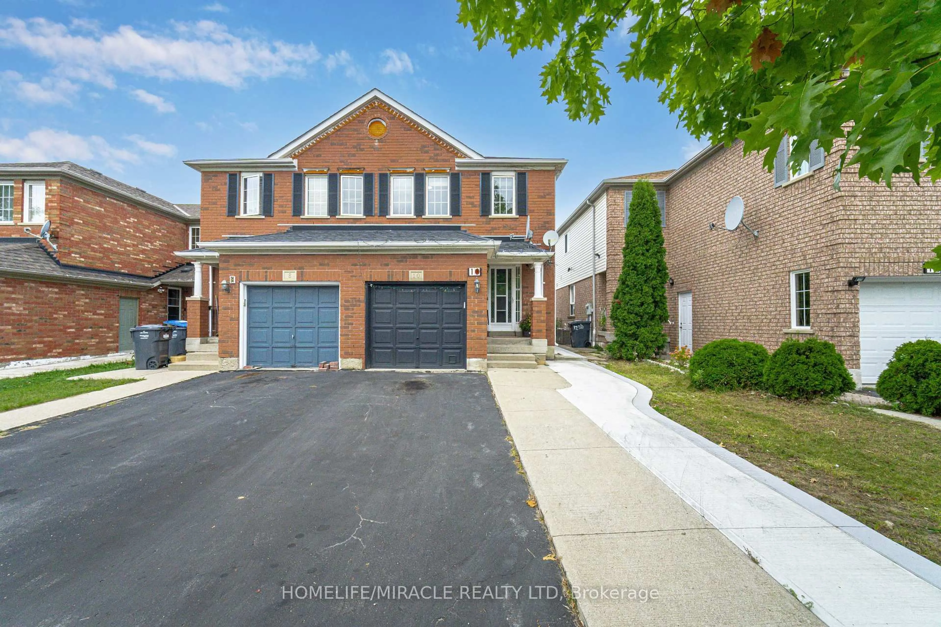 Home with brick exterior material, street for 10 Hackberry Gate, Brampton Ontario L6R 2E7