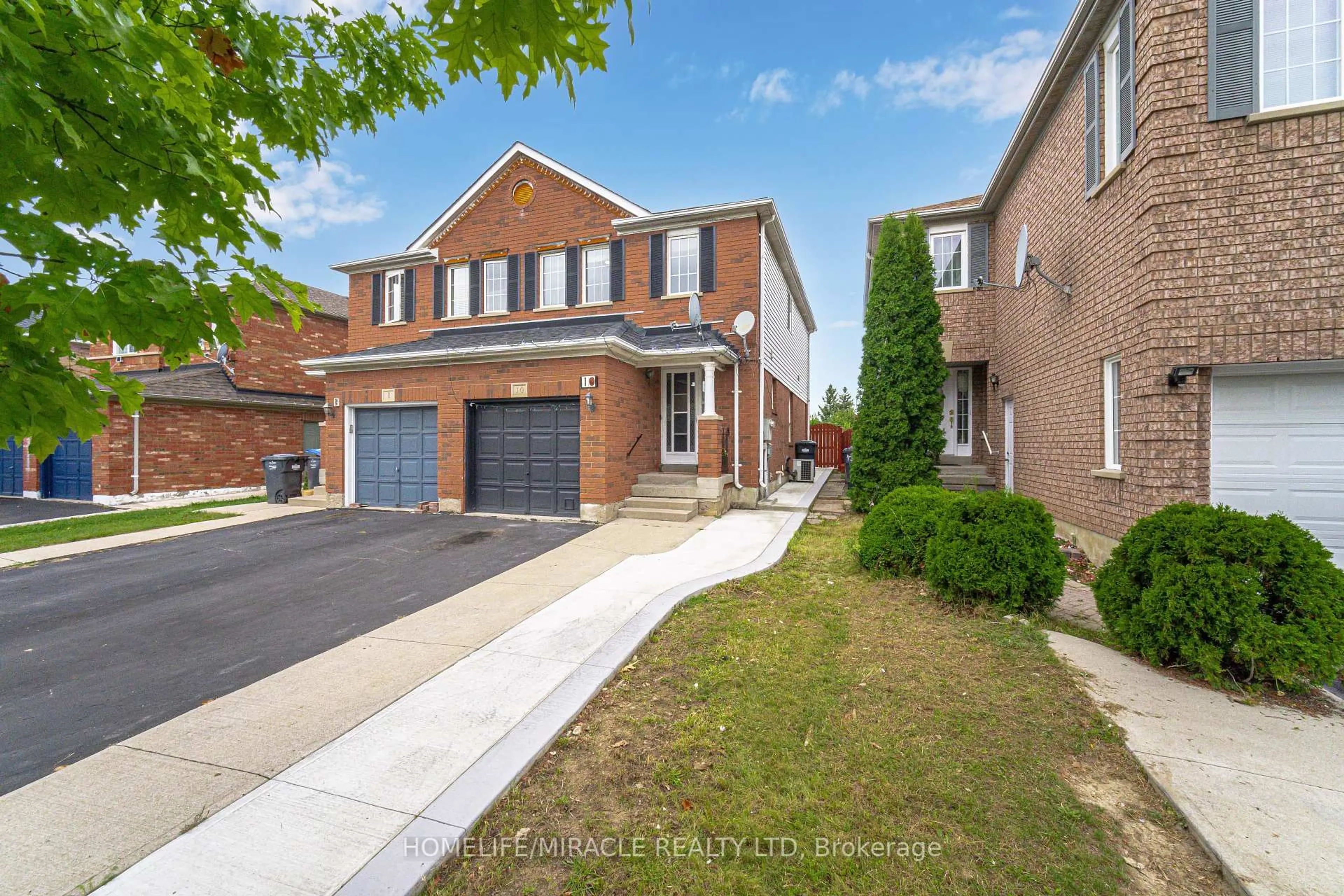 Home with brick exterior material, street for 10 Hackberry Gate, Brampton Ontario L6R 2E7