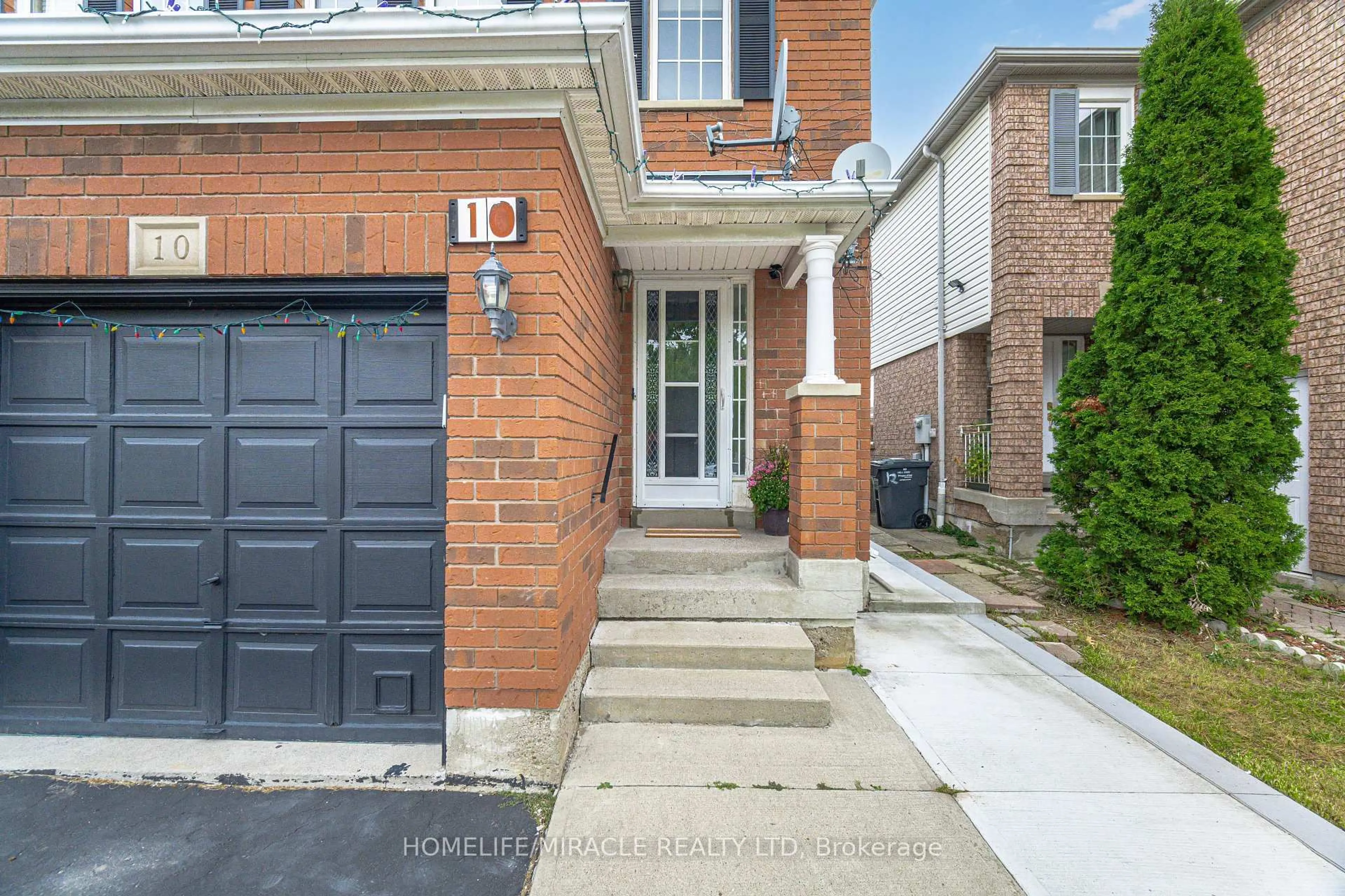 Home with brick exterior material, street for 10 Hackberry Gate, Brampton Ontario L6R 2E7