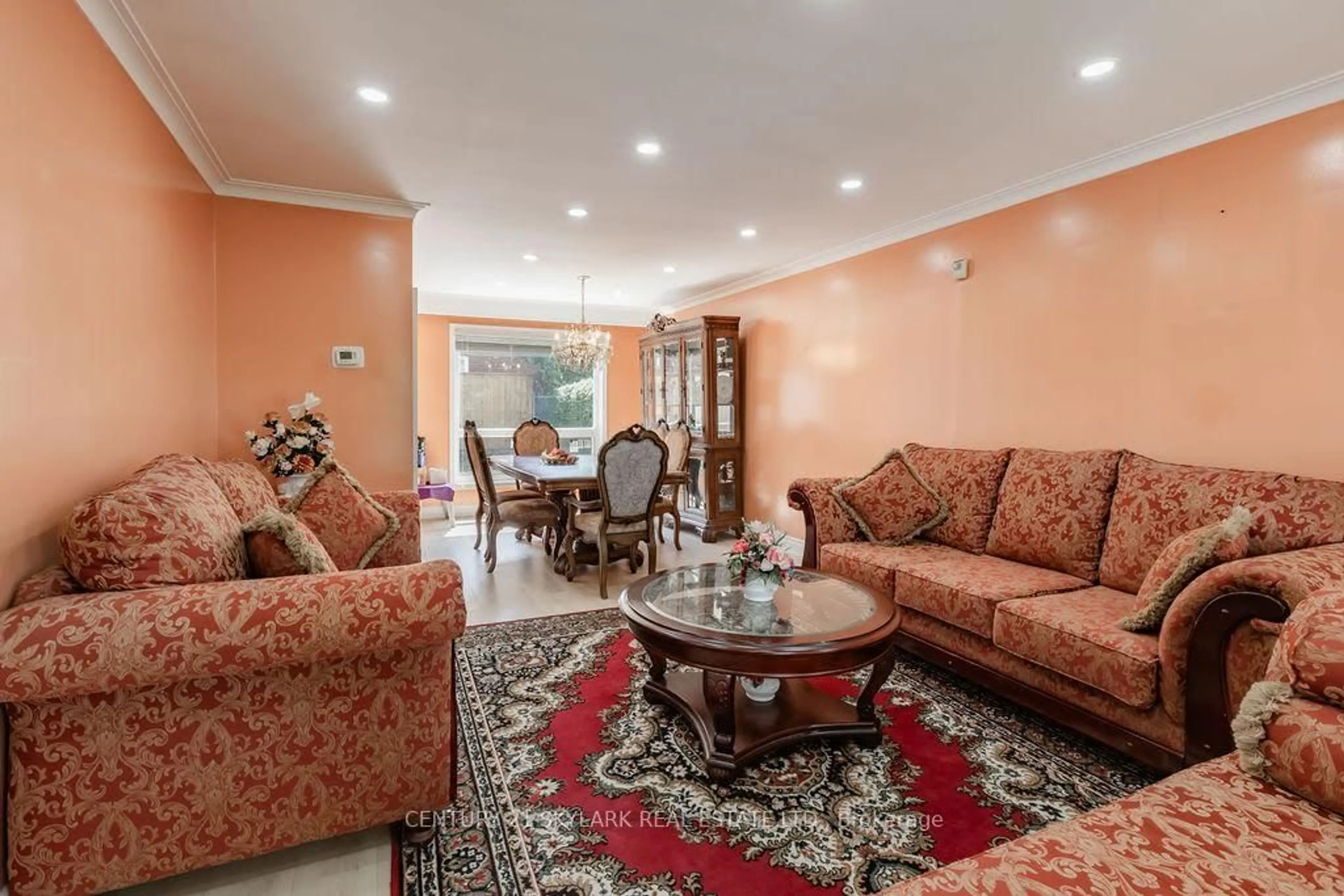 Living room with furniture, carpet floor for 174 Silverstone Dr, Toronto Ontario M9V 3G9