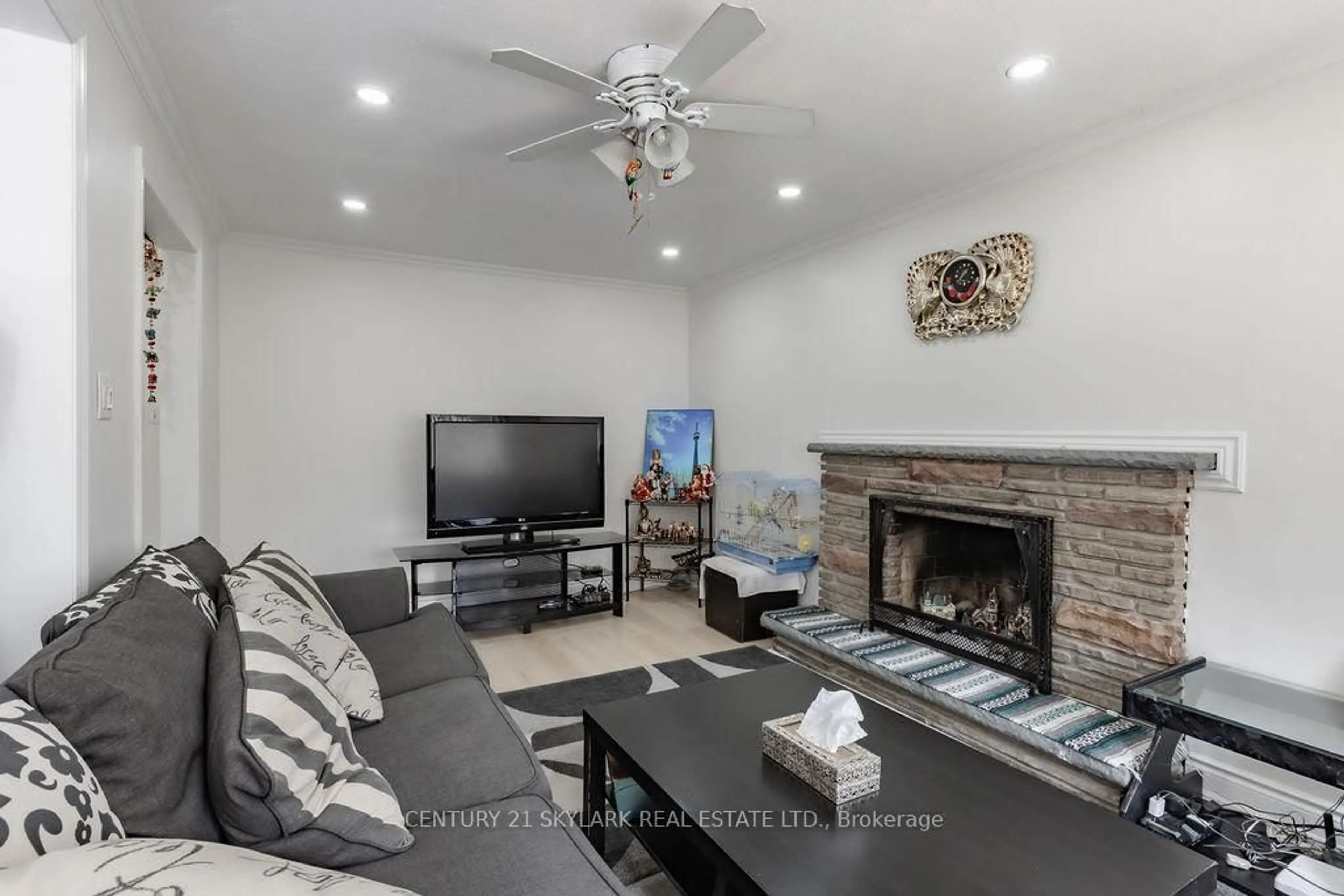 Living room with furniture, ceramic/tile floor for 174 Silverstone Dr, Toronto Ontario M9V 3G9