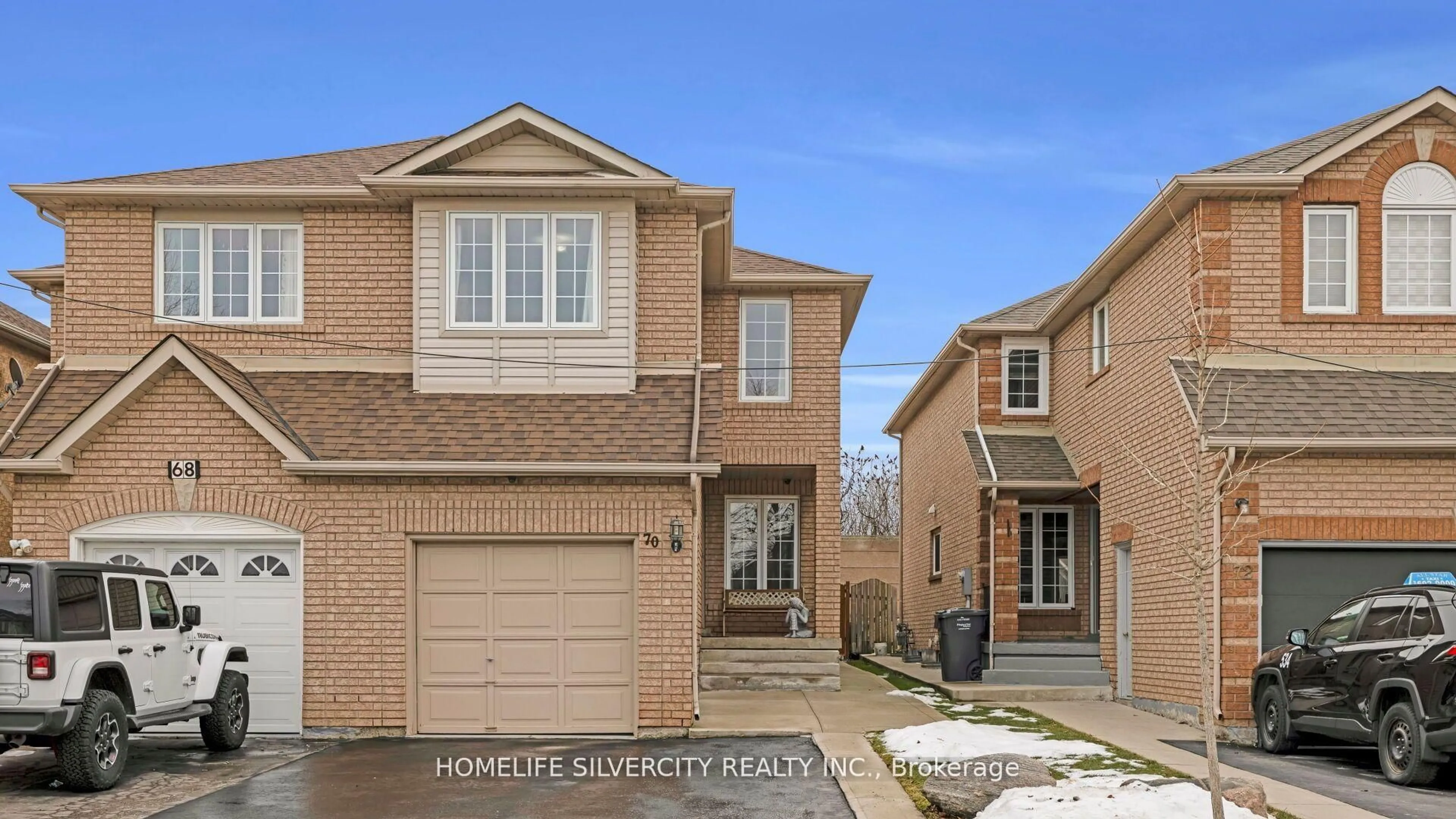 Home with brick exterior material, street for 70 Tumbleweed Tr, Brampton Ontario L6Y 4Z9