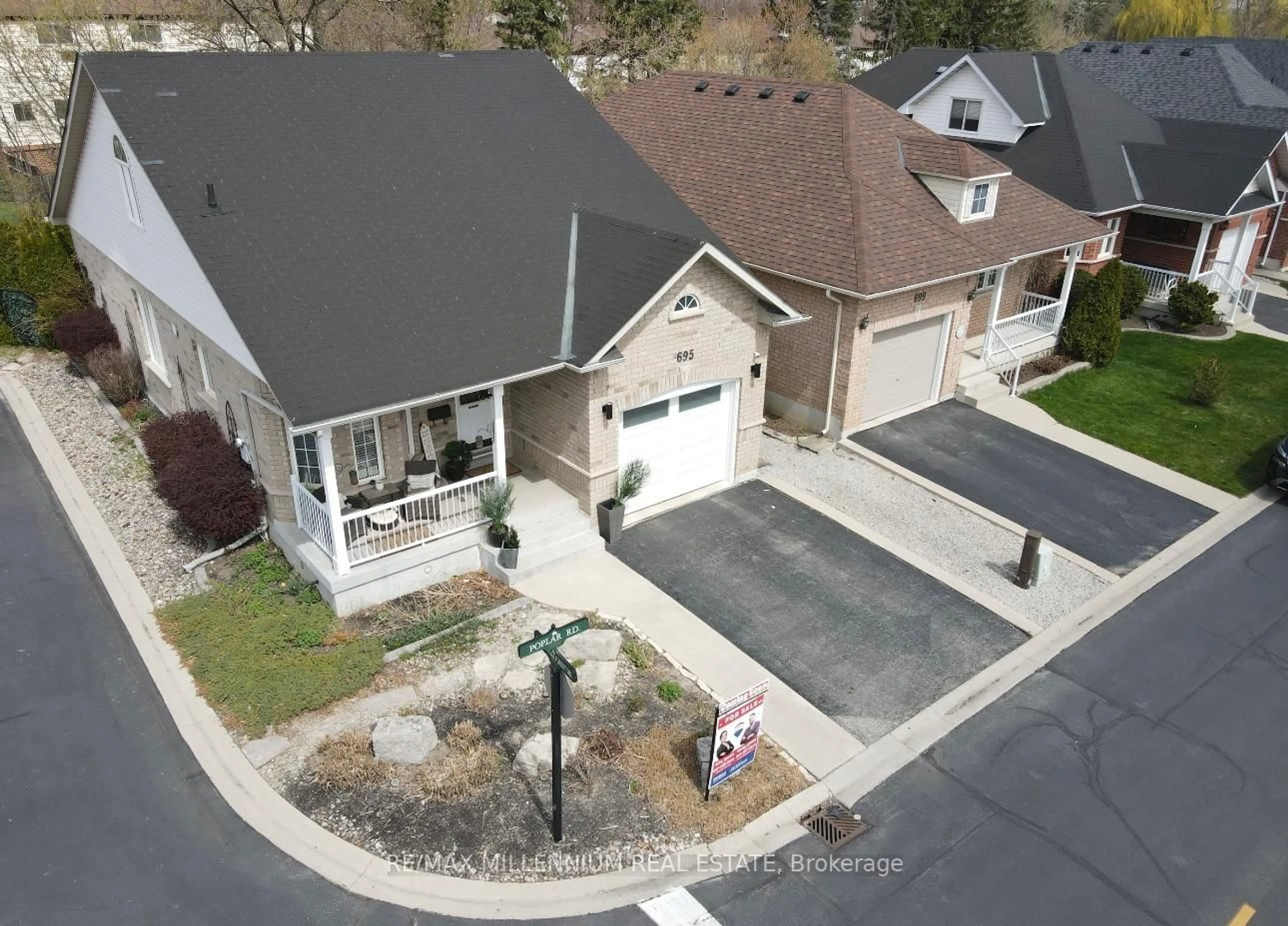 A pic from outside/outdoor area/front of a property/back of a property/a pic from drone, street for 695 Poplar Rd, Milton Ontario L9T 5W9