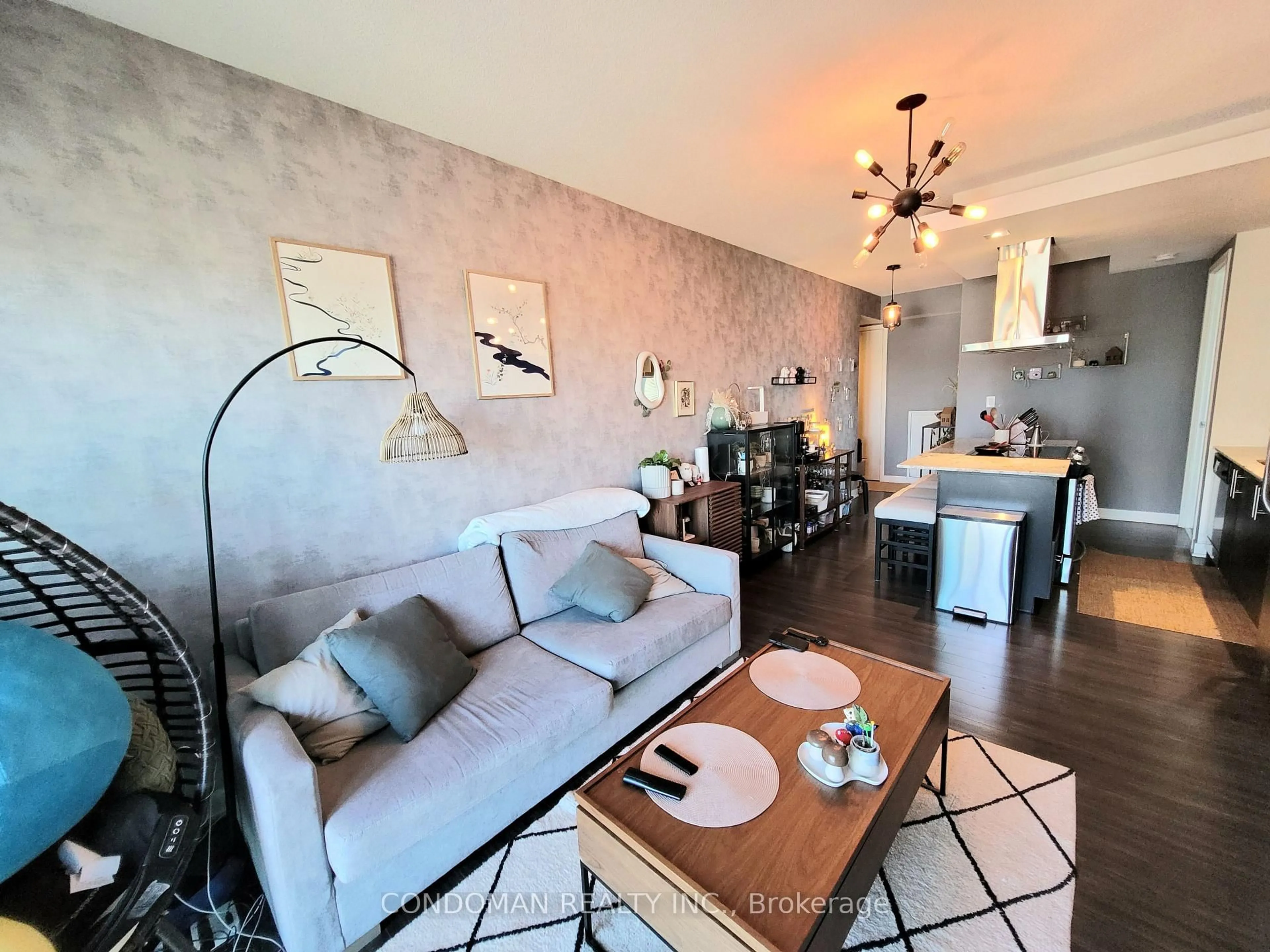 Living room with furniture, wood/laminate floor for 165 Legion Rd #1924, Toronto Ontario M8Y 0B3