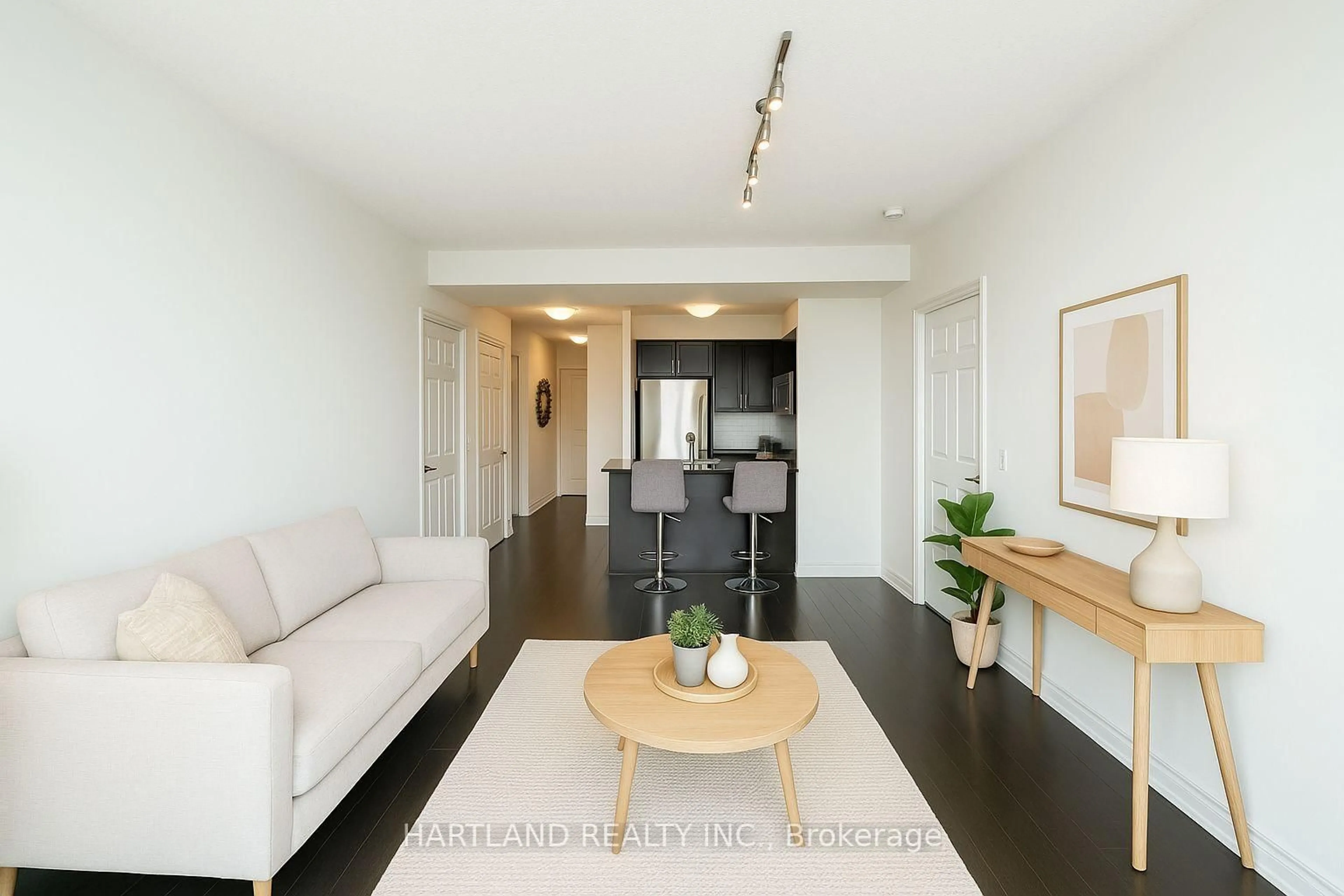 Living room with furniture, wood/laminate floor for 339 Rathburn Rd #1901, Mississauga Ontario L5B 0K6