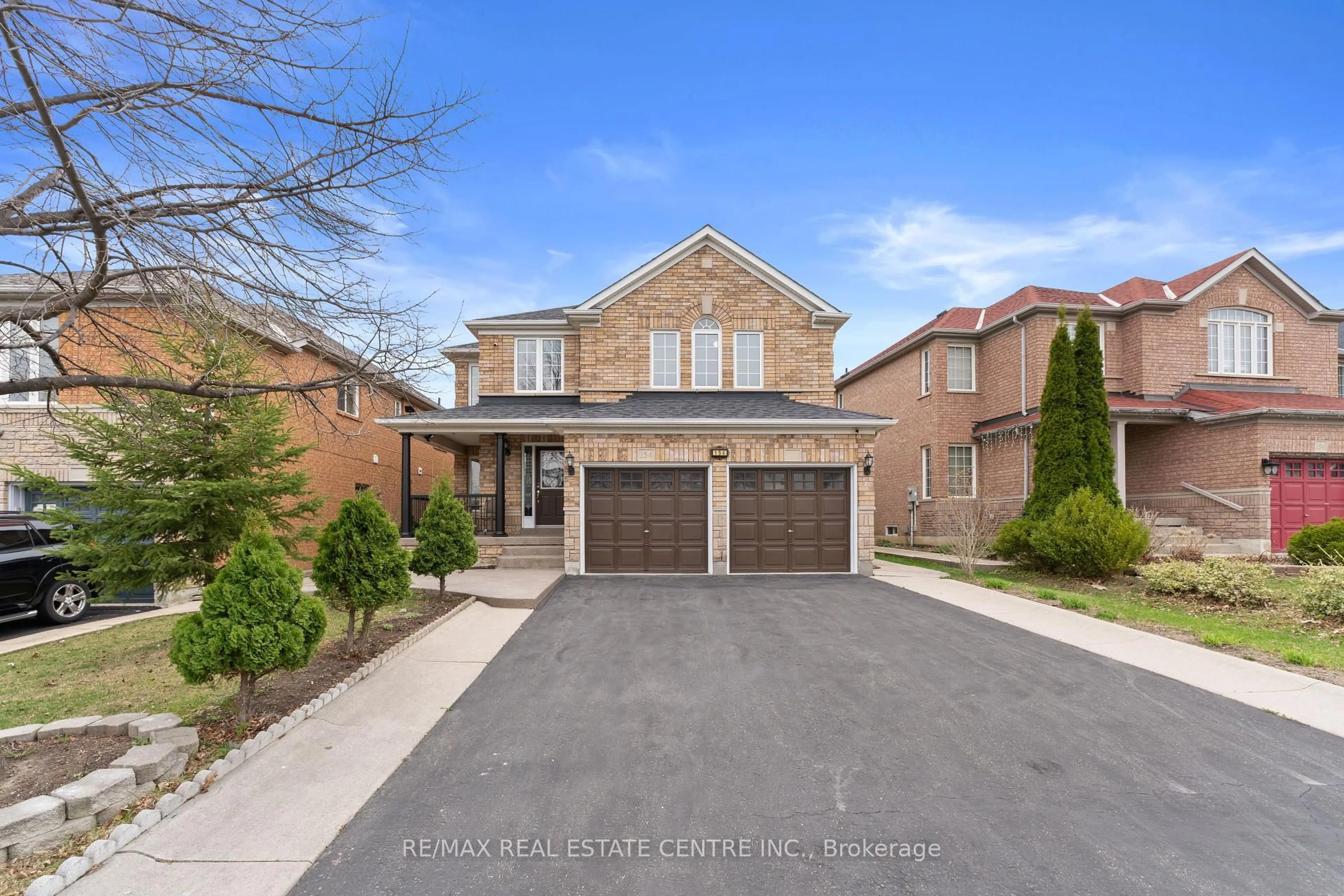 Home with brick exterior material, street for 154 Sunny Meadow Blvd, Brampton Ontario L6R 2Z2