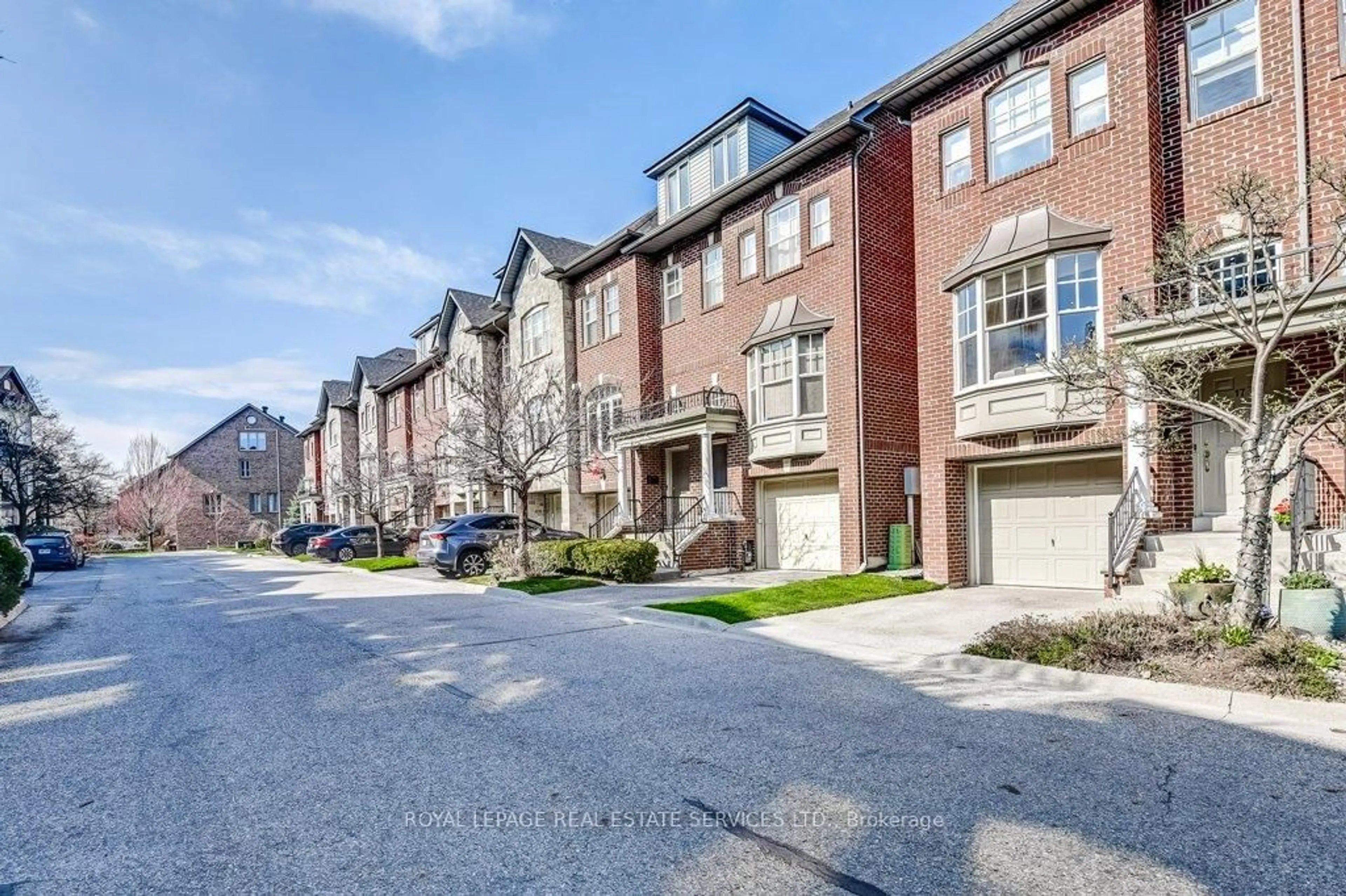Home with brick exterior material, street for 17 Leaves Terr, Toronto Ontario M8Y 4H4