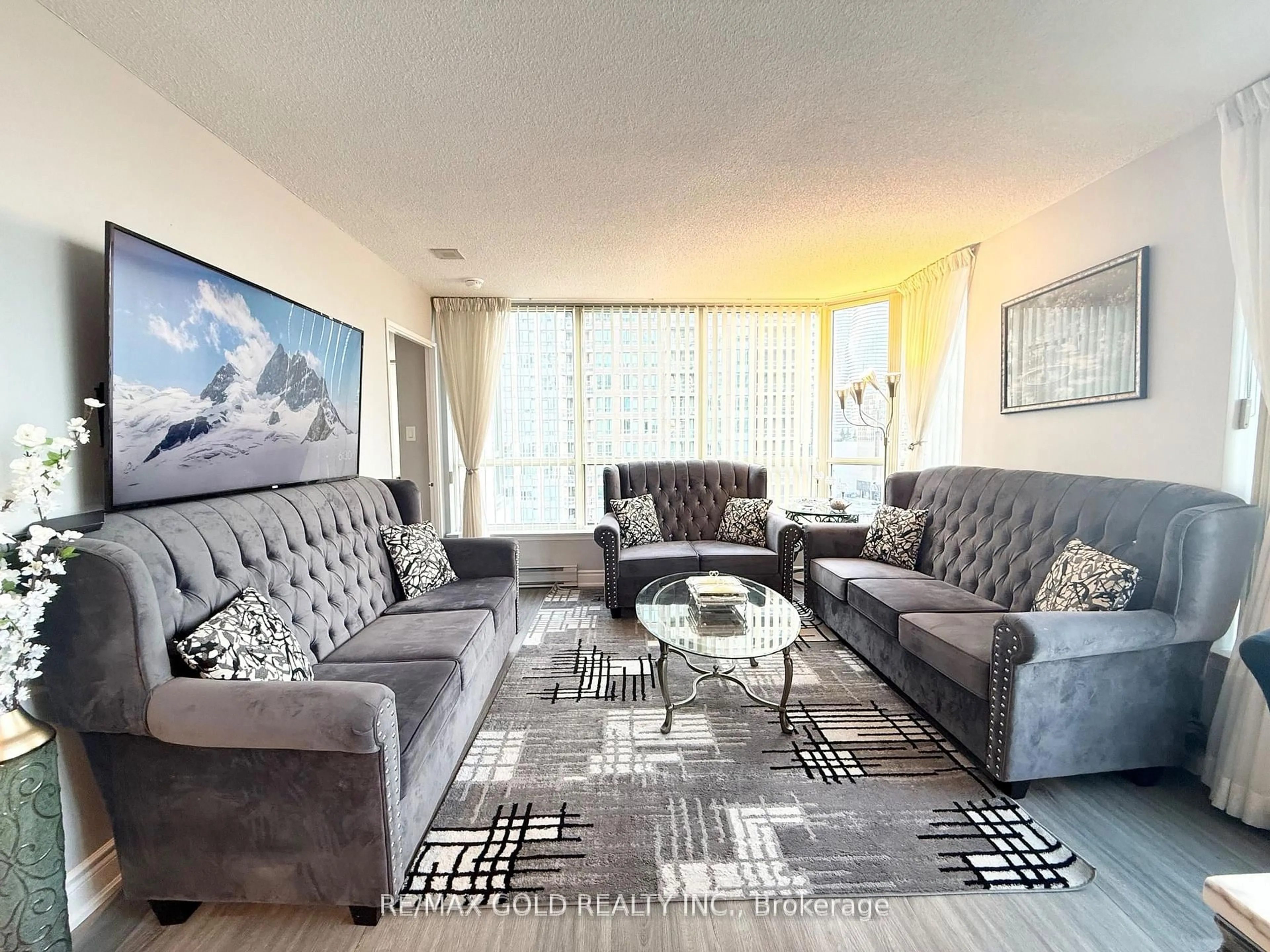 Living room with furniture, unknown for 55 Elm Dr #805, Mississauga Ontario L5B 3Z3