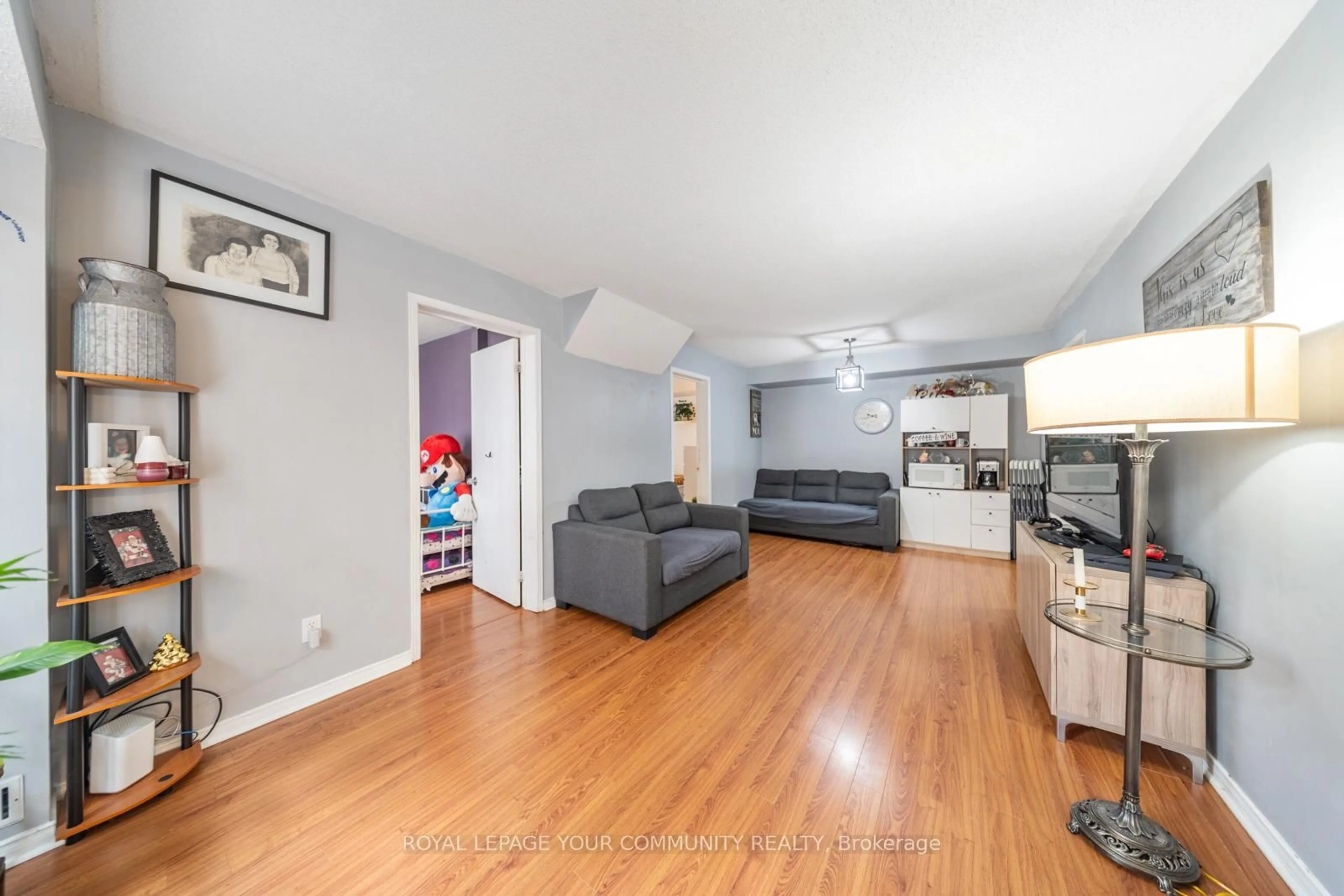 Living room with furniture, unknown for 58 Sidney Belsey Cres #202, Toronto Ontario M6M 5J3
