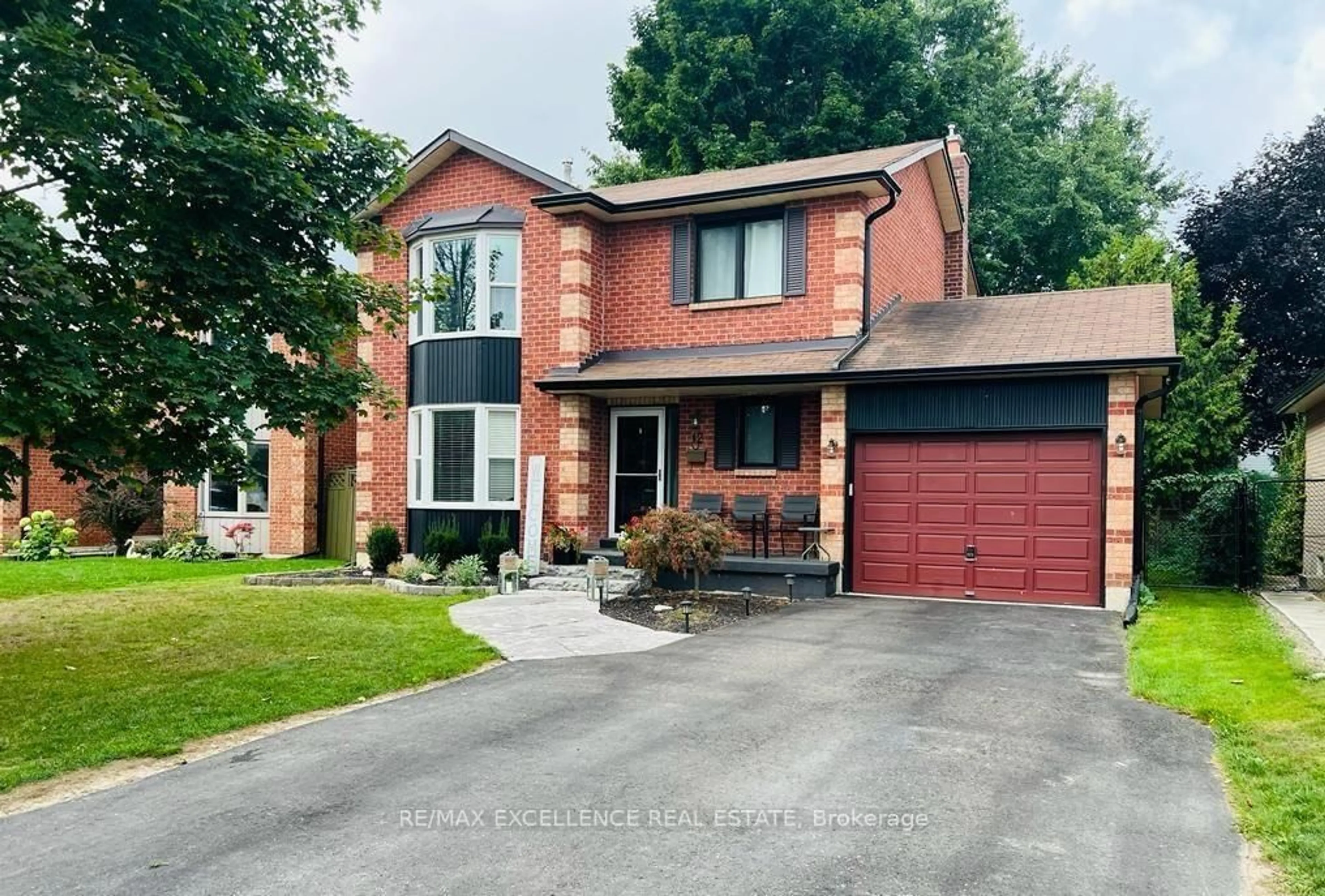 Home with brick exterior material, street for 12 Fieldgate Dr, Orangeville Ontario L9W 4K8