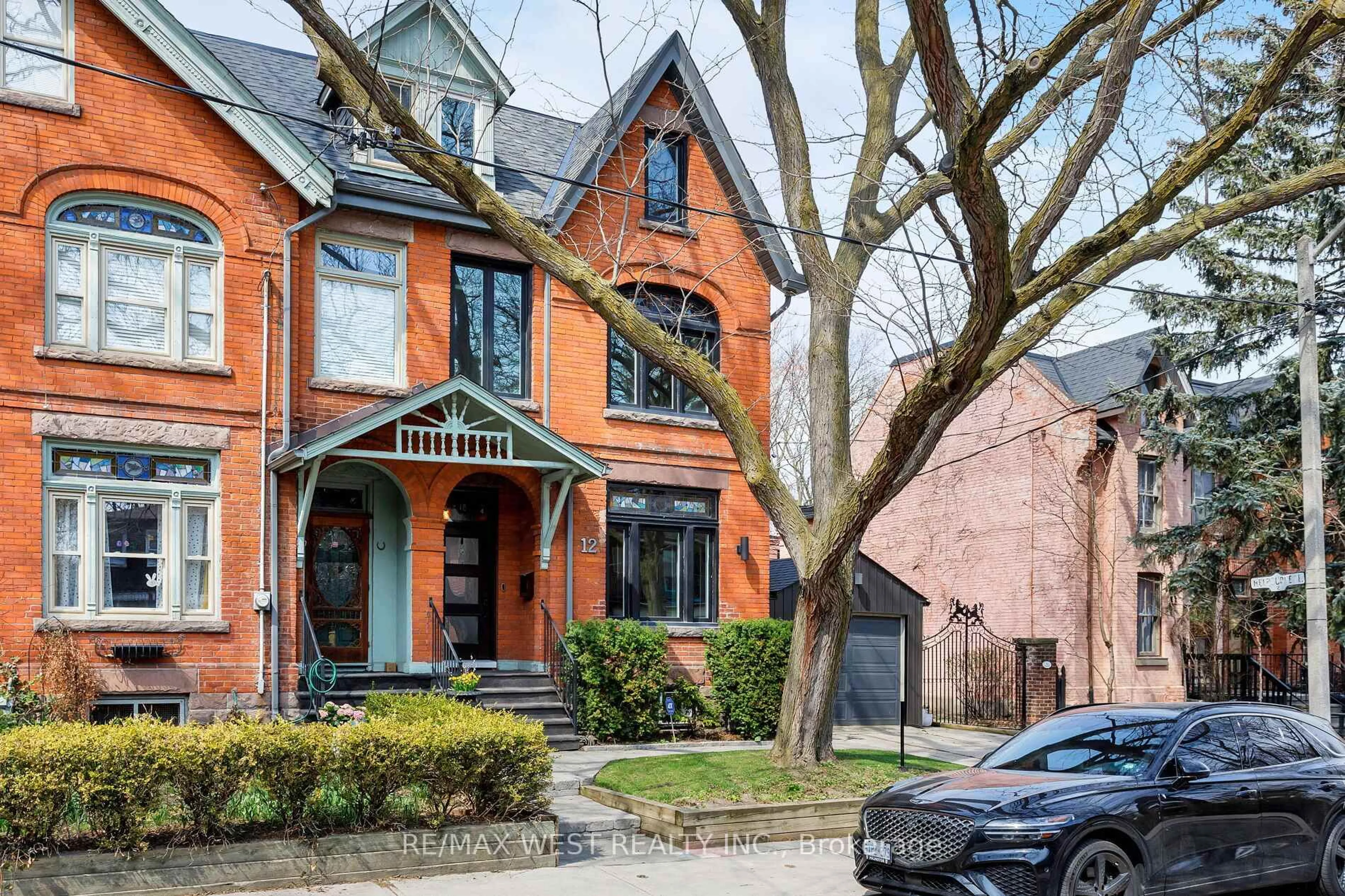 Home with brick exterior material, street for 12 Melbourne Ave, Toronto Ontario M6K 1K3