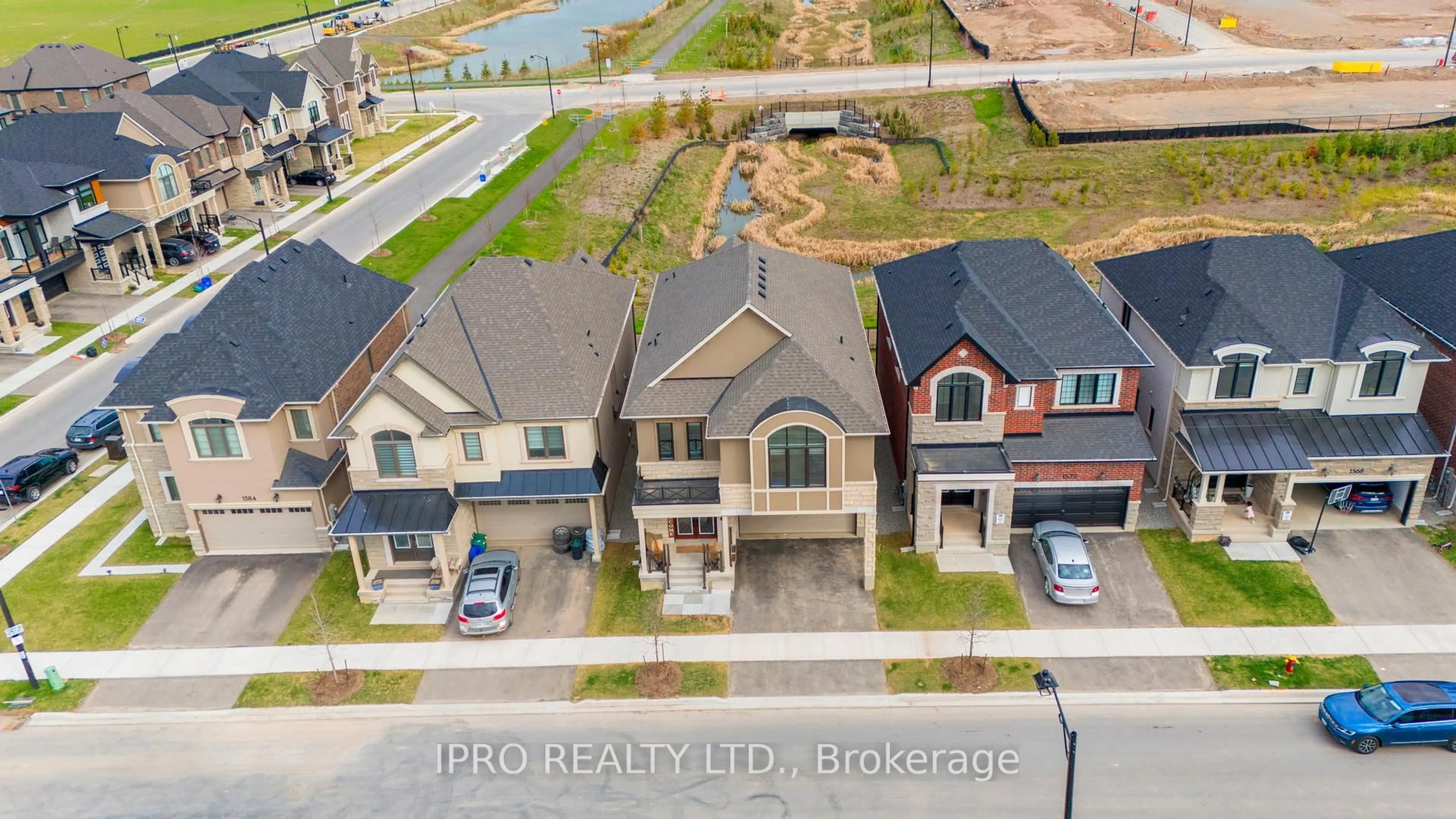 A pic from outside/outdoor area/front of a property/back of a property/a pic from drone, street for 1576 Cookman Dr, Milton Ontario L9E 2A7