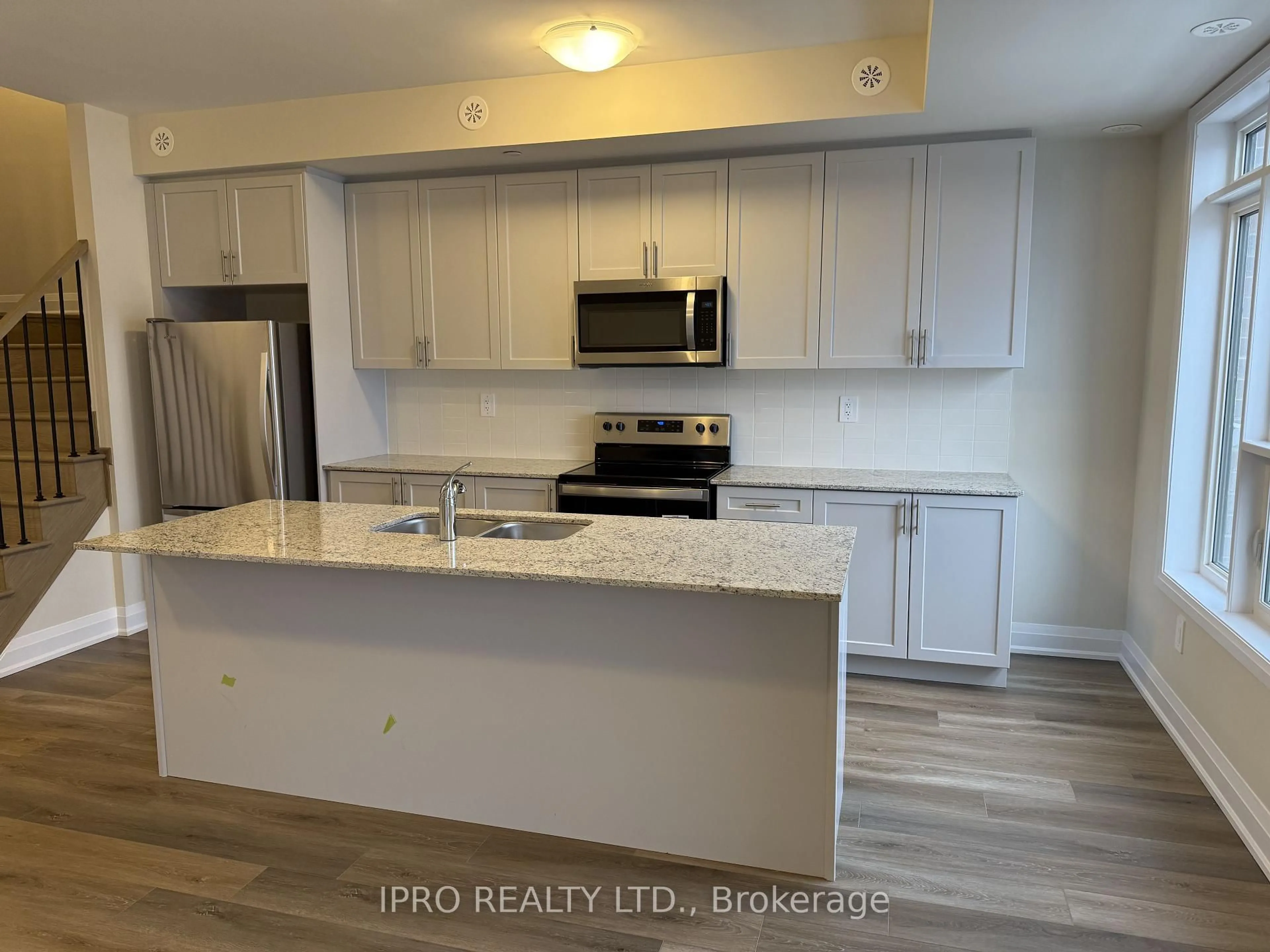 Open concept kitchen, unknown for 1581 Rose Way #115, Milton Ontario L9E 1N4