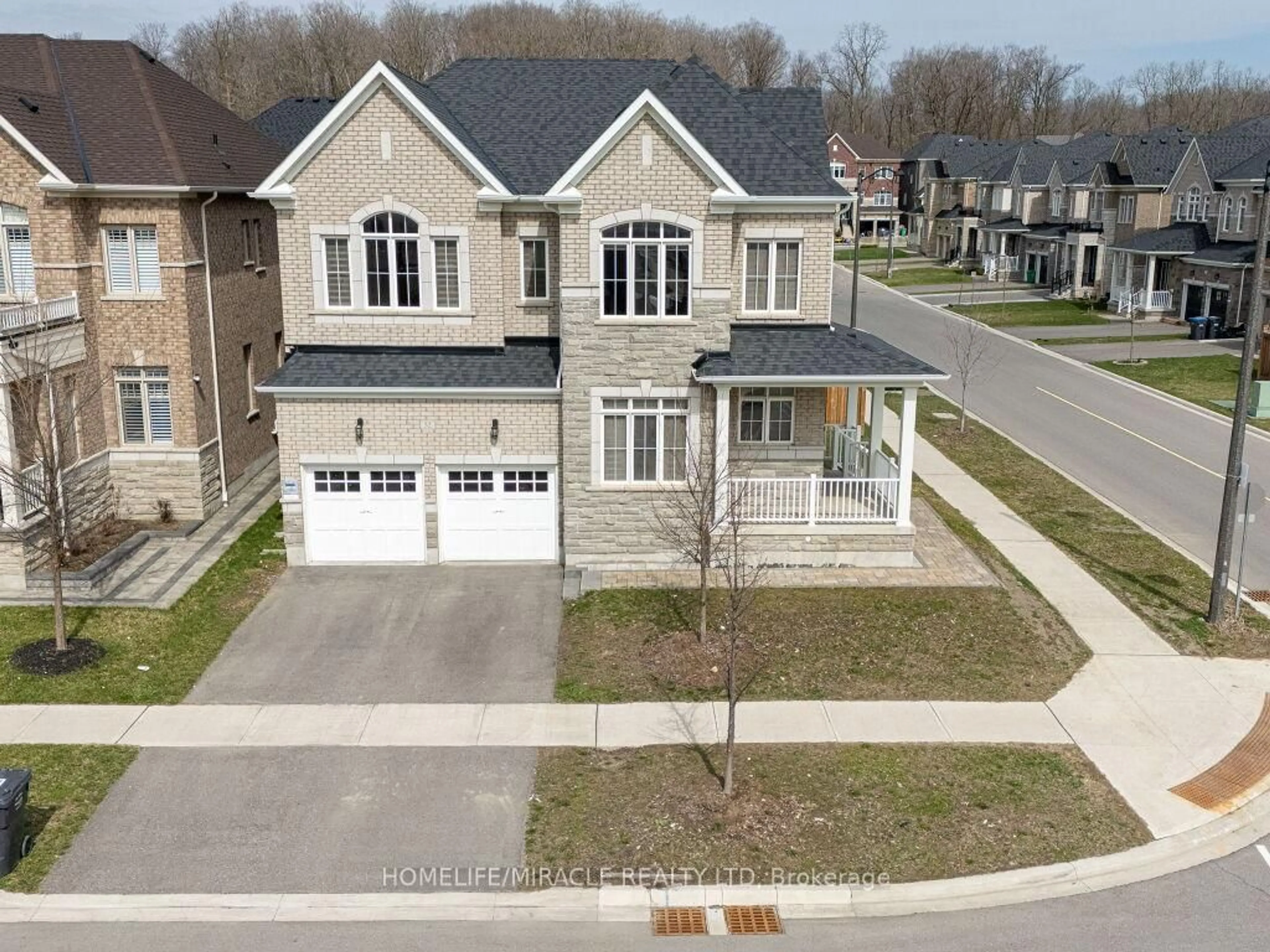 A pic from outside/outdoor area/front of a property/back of a property/a pic from drone, street for 52 Albert Spencer Ave, Caledon Ontario L7C 4G2