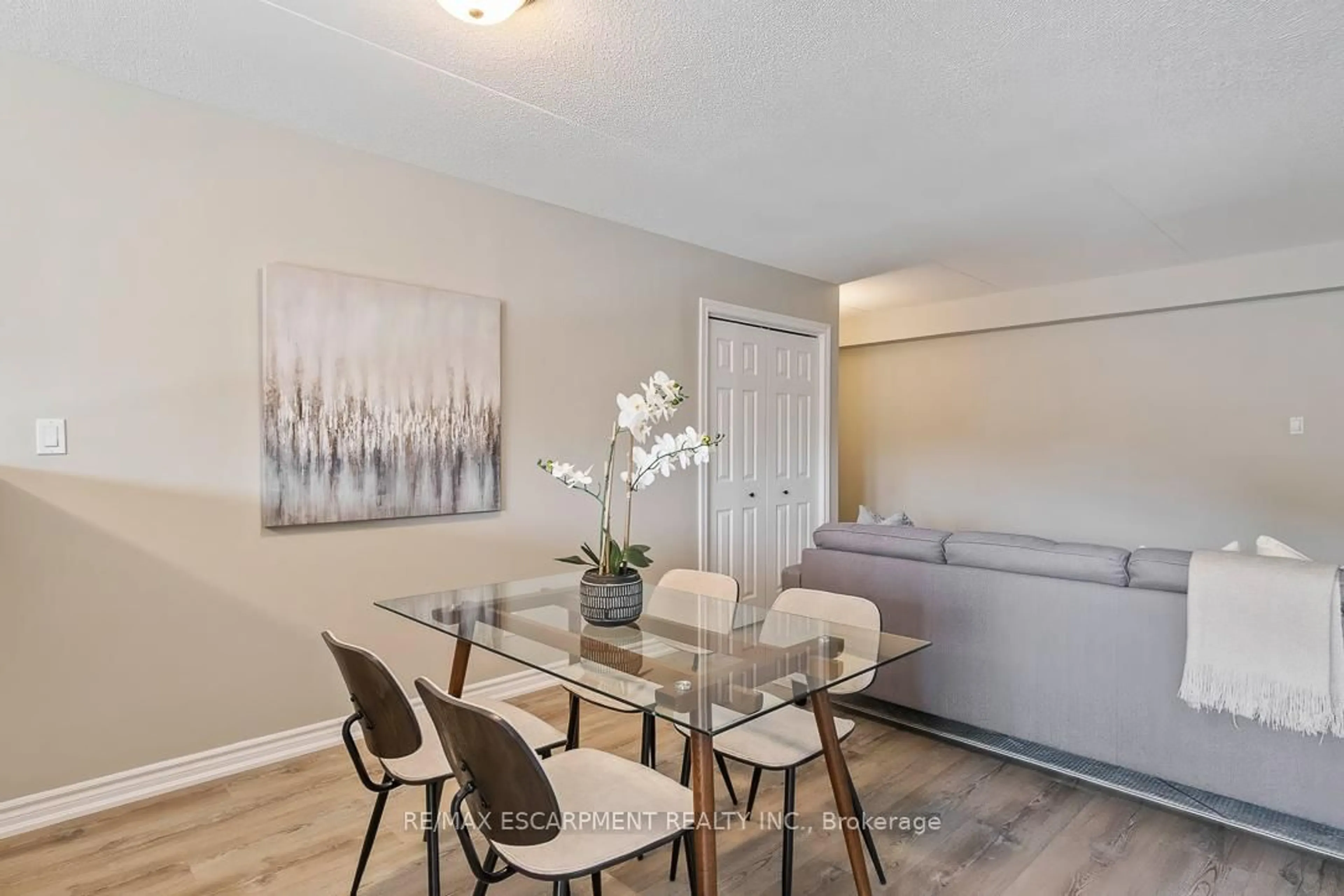 Dining room, wood/laminate floor for 1830 Walkers Line #301, Burlington Ontario L7M 4V5
