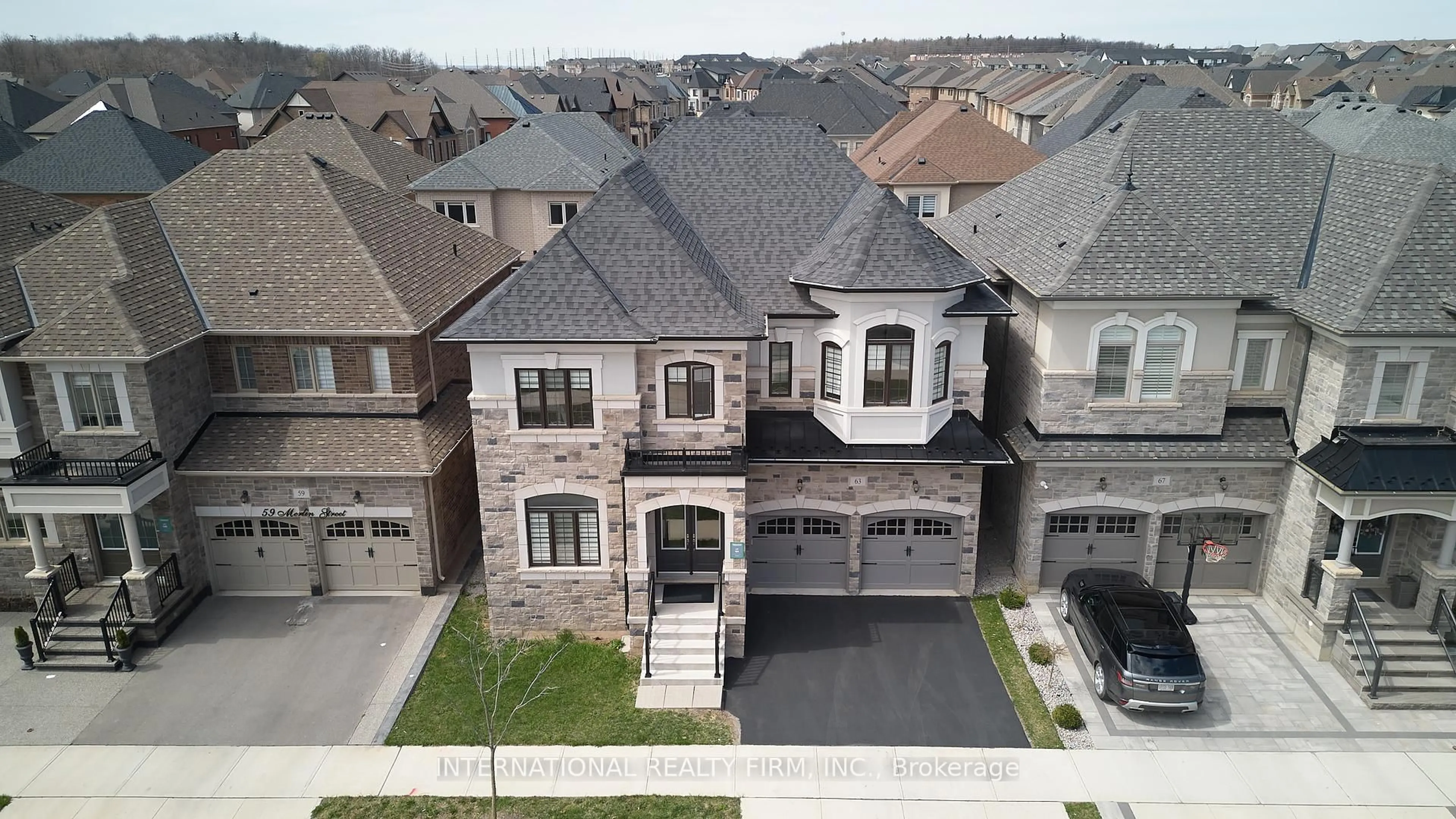 A pic from outside/outdoor area/front of a property/back of a property/a pic from drone, street for 63 Merlin St, Oakville Ontario L6H 0Z4