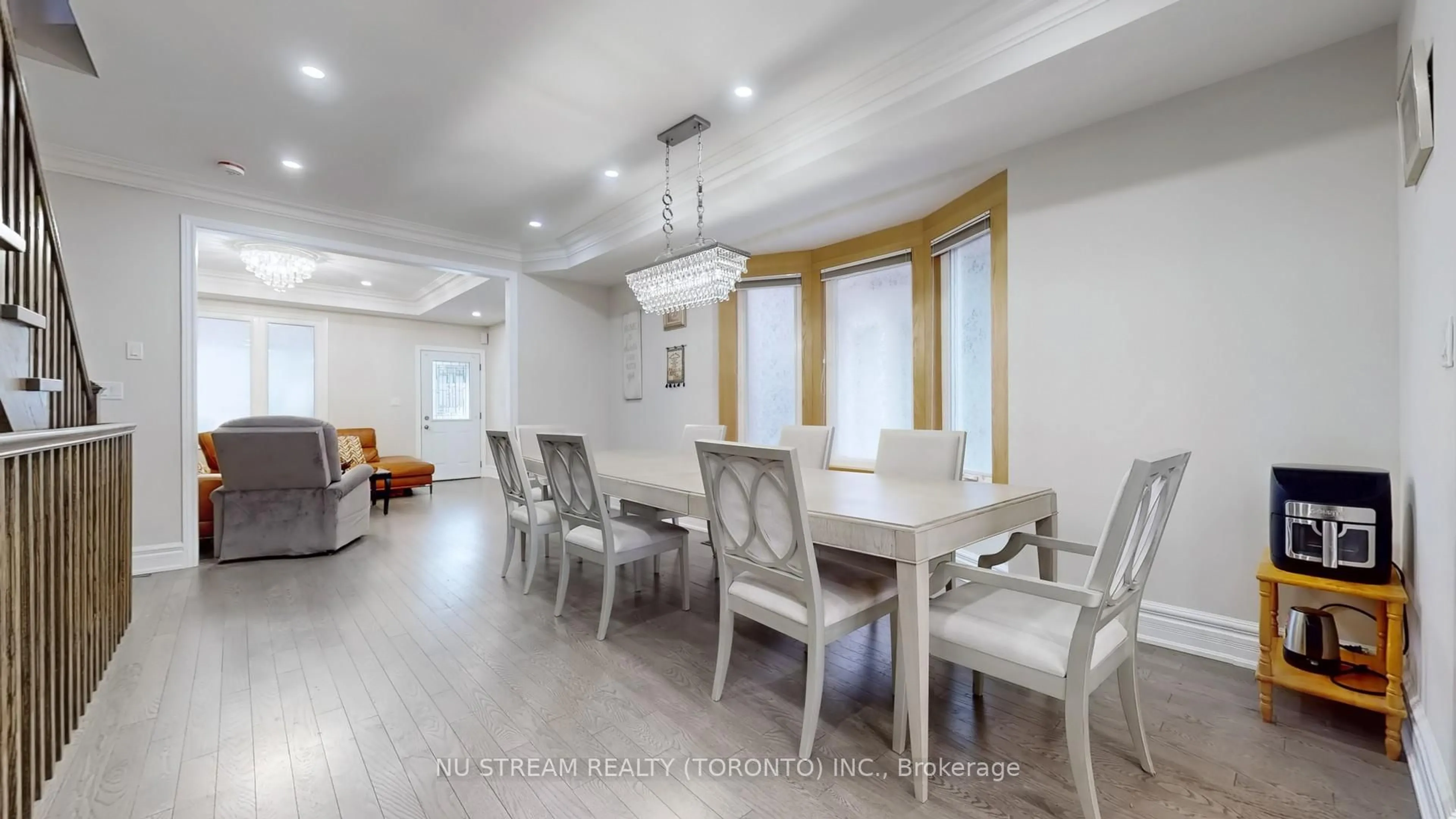 Dining room, wood/laminate floor for 1040 Ossington Ave, Toronto Ontario M6G 3V6
