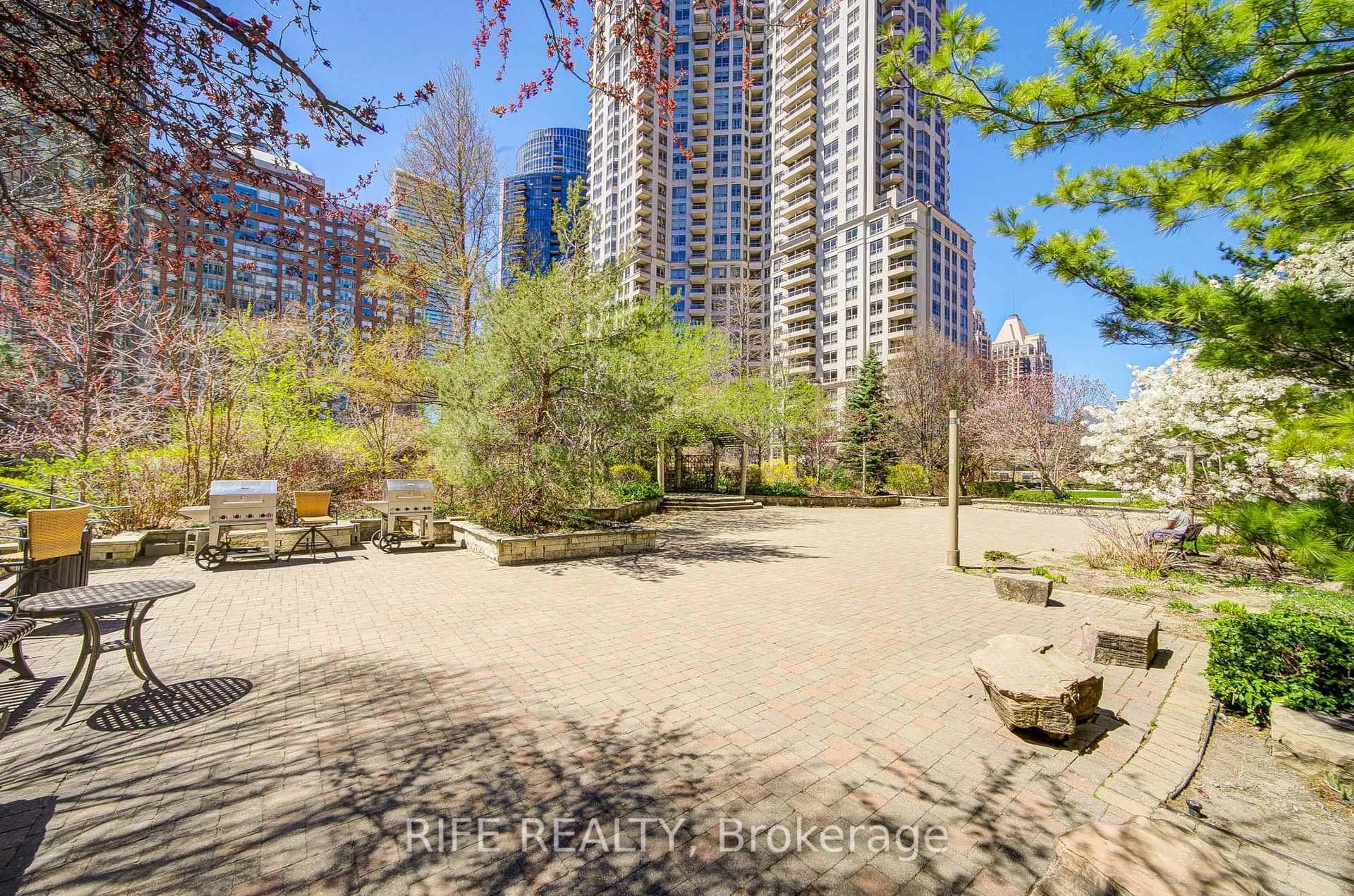 Patio, city buildings view from balcony for 3880 Duke Of York Blvd #GPH10, Mississauga Ontario L5B 4M7