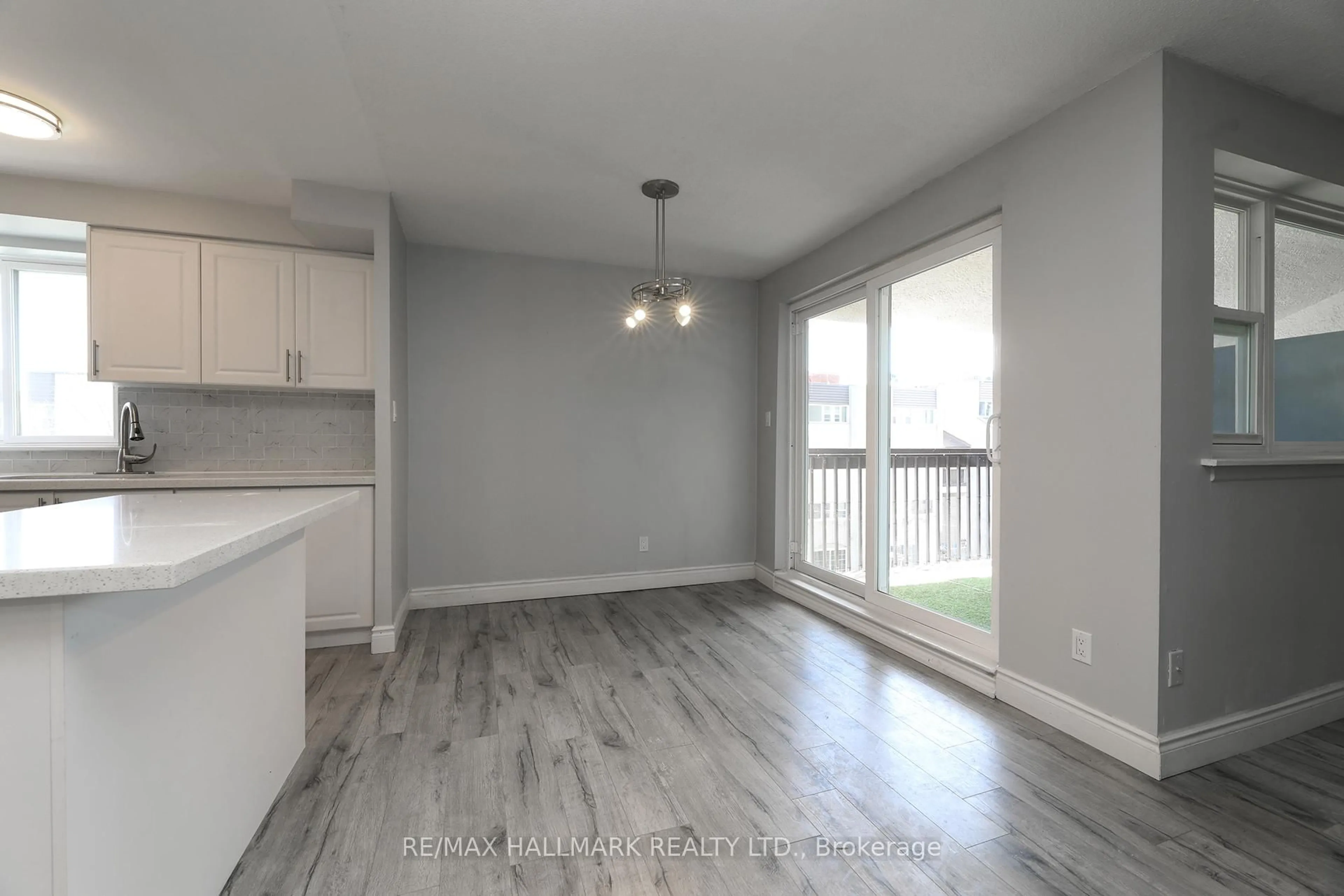 Open concept kitchen, wood/laminate floor for 3050 Constitution Blvd #50, Mississauga Ontario L4Y 3X1