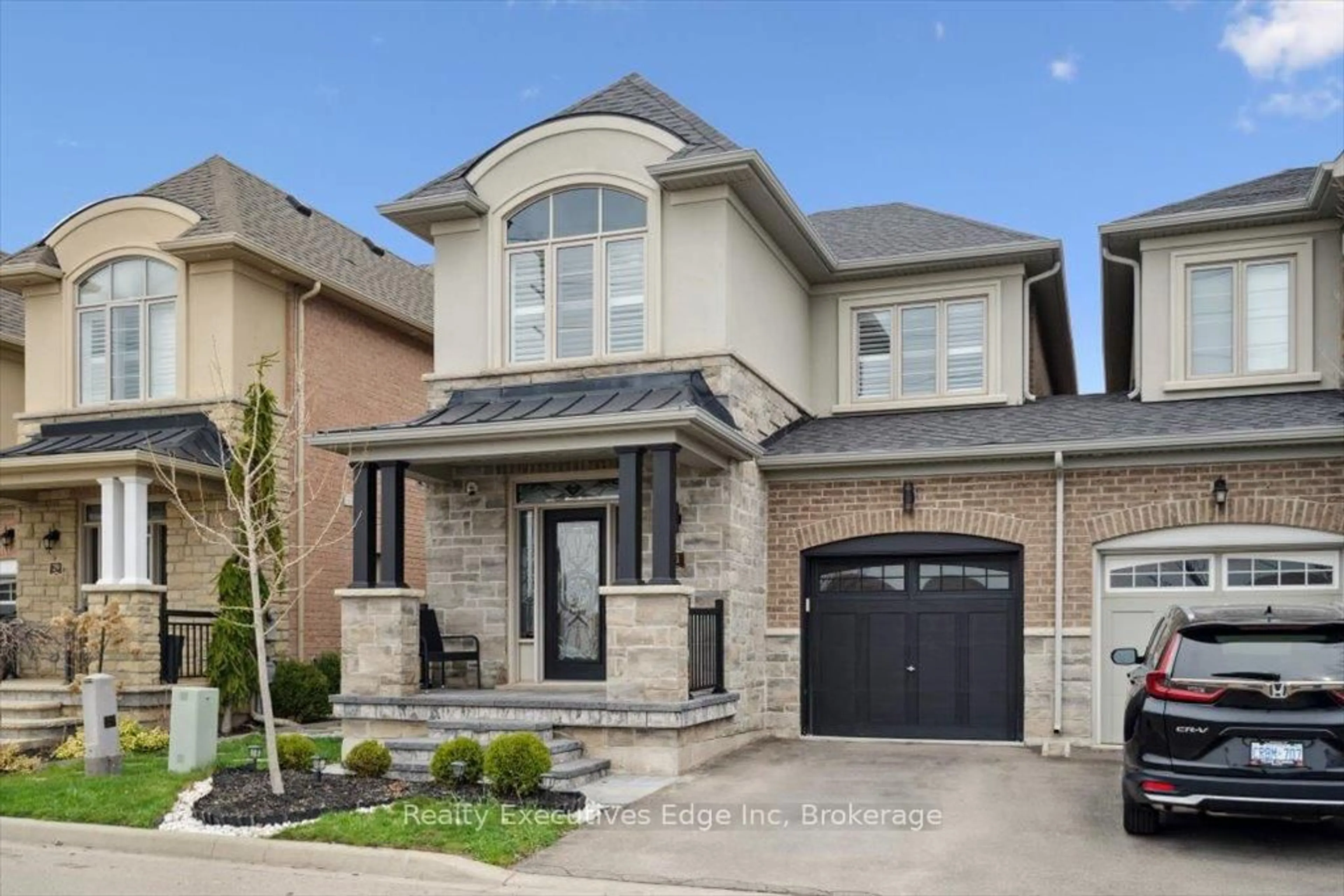 Home with brick exterior material, street for 31 Rainforest Lane, Halton Hills Ontario L7G 0L8