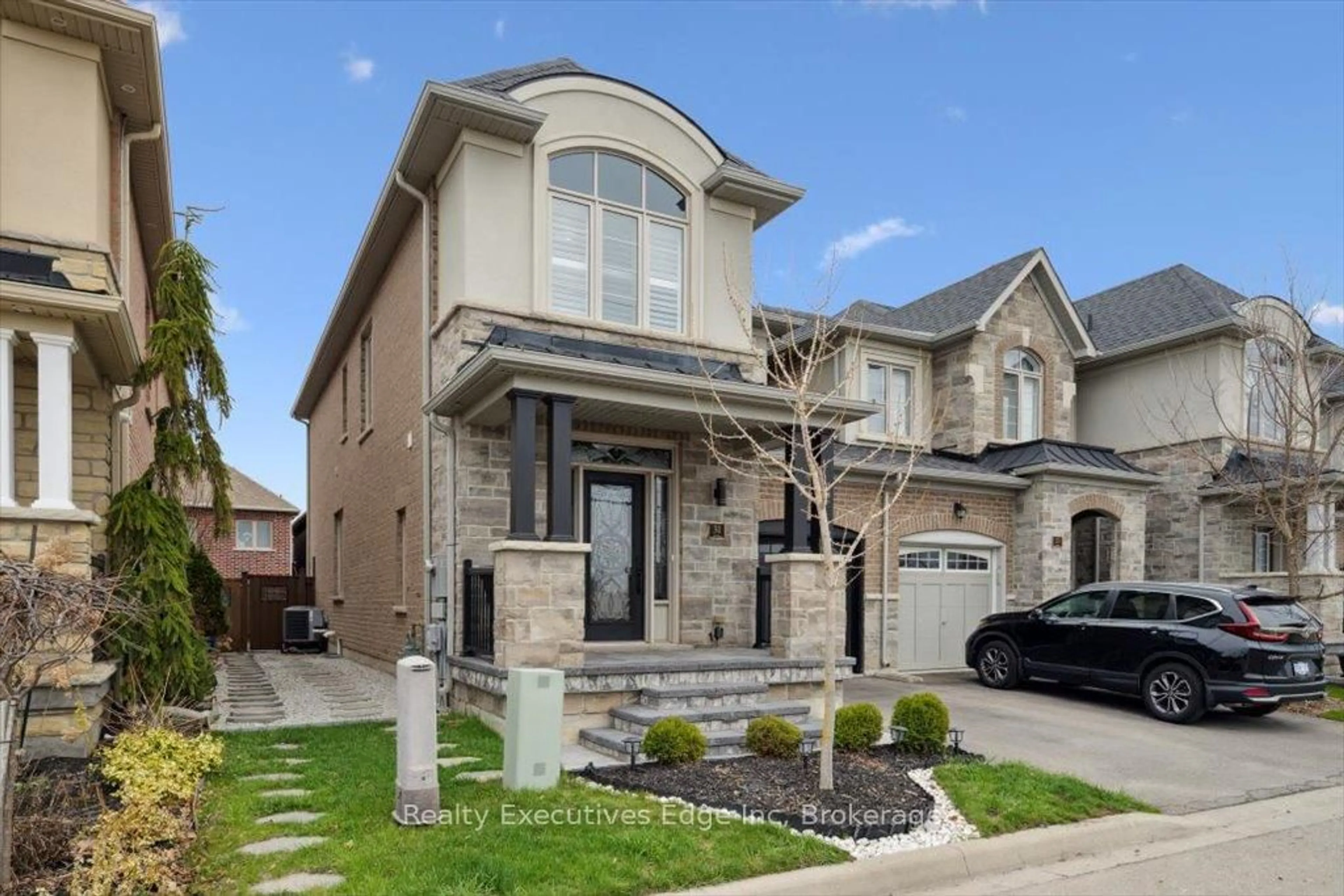 Home with brick exterior material, street for 31 Rainforest Lane, Halton Hills Ontario L7G 0L8