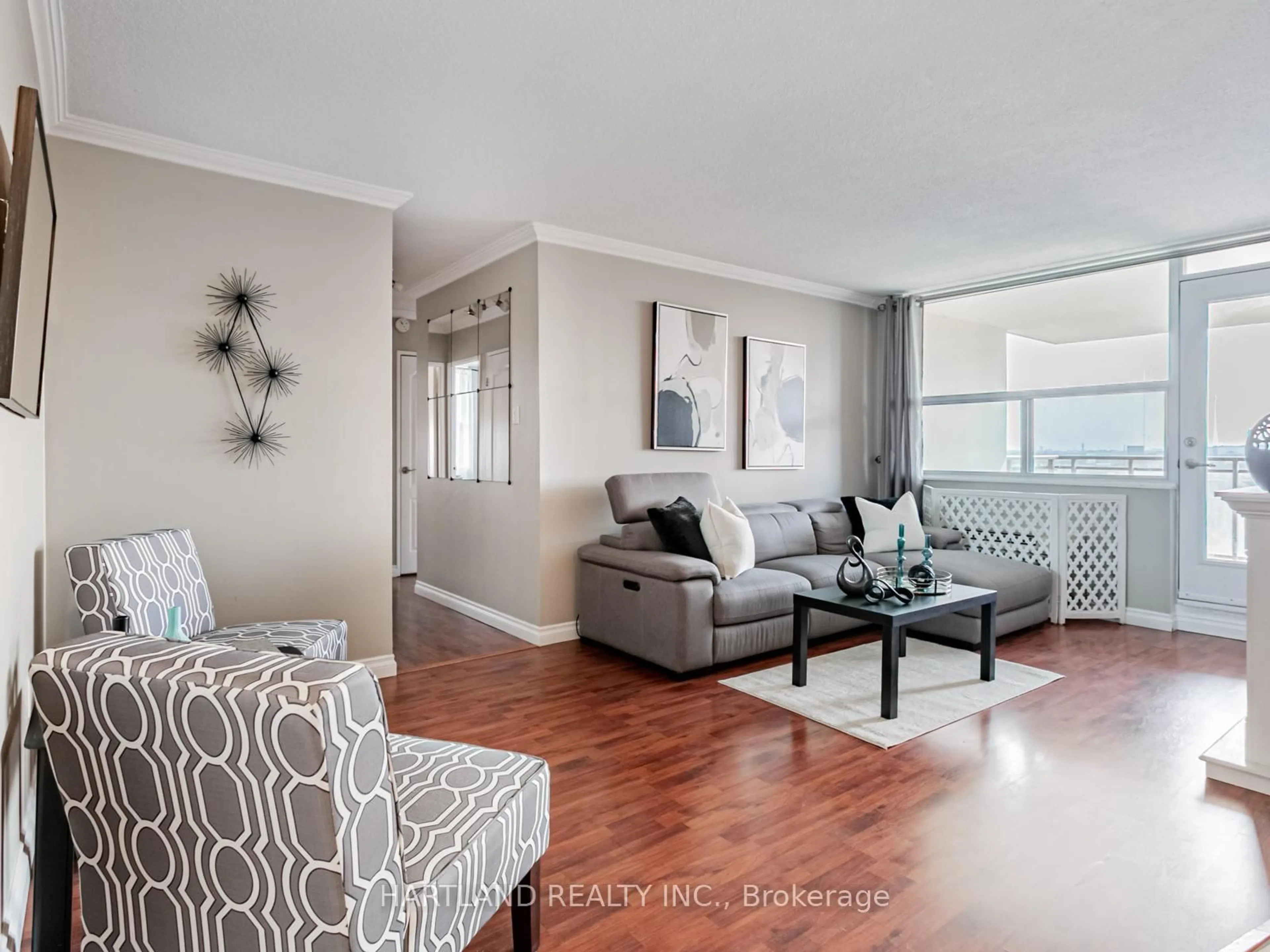Living room with furniture, wood/laminate floor for 966 Inverhouse Dr #701, Mississauga Ontario L5J 4B6