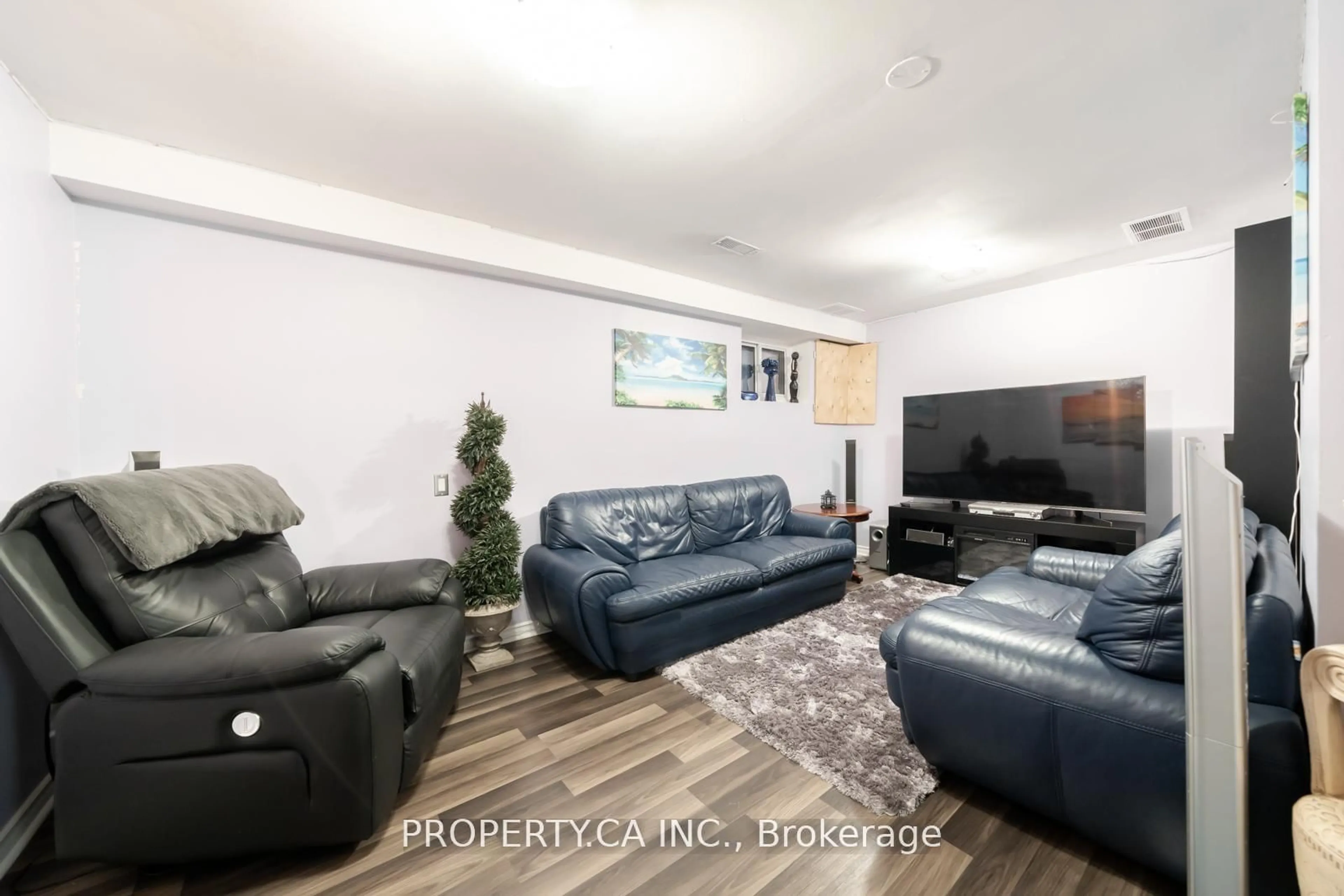 Living room with furniture, unknown for 64 Dawson Cres, Brampton Ontario L6V 3M6