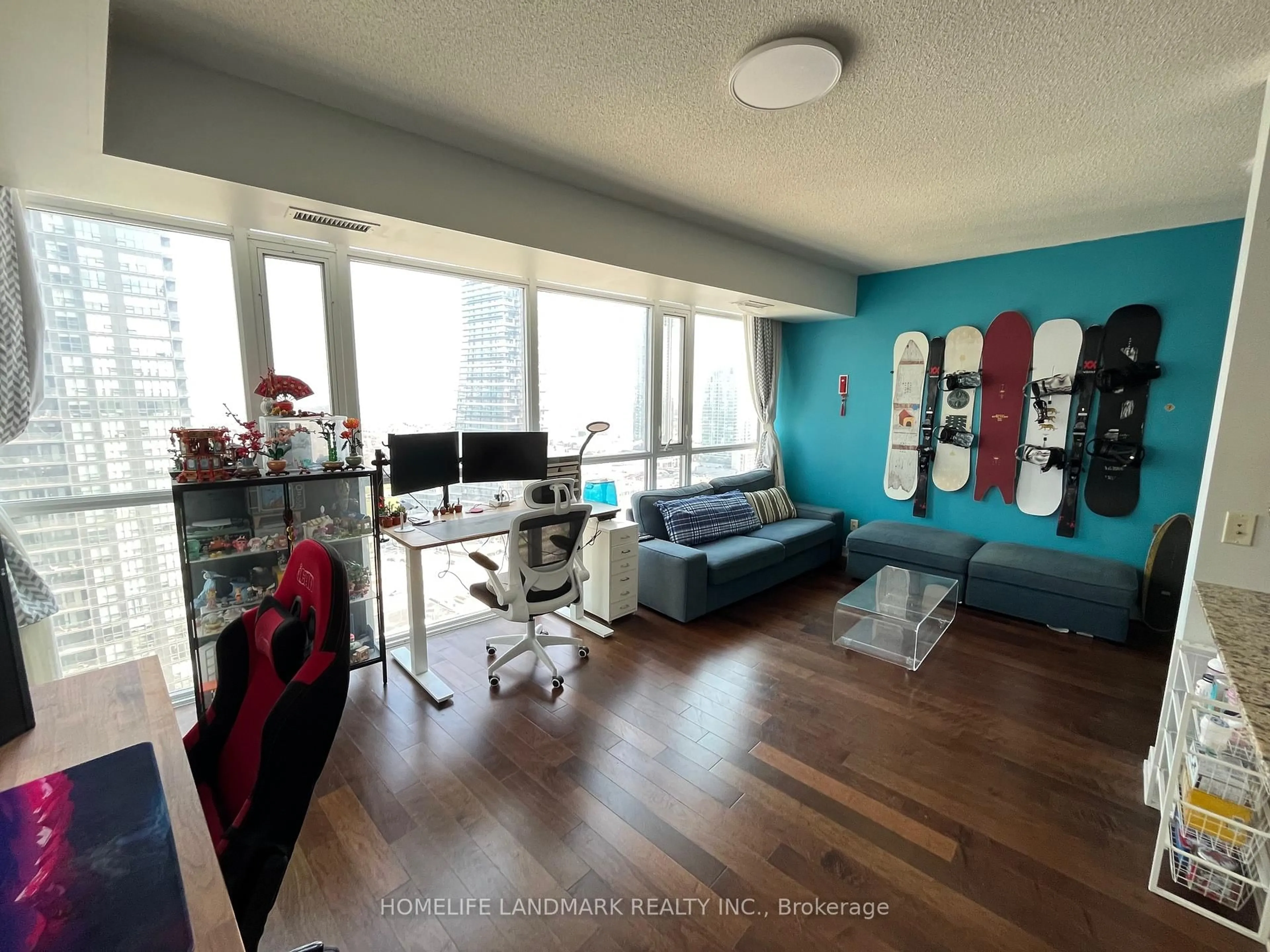 Living room with furniture, wood/laminate floor for 4065 Brickstone Mews #2203, Mississauga Ontario L5B 0G3