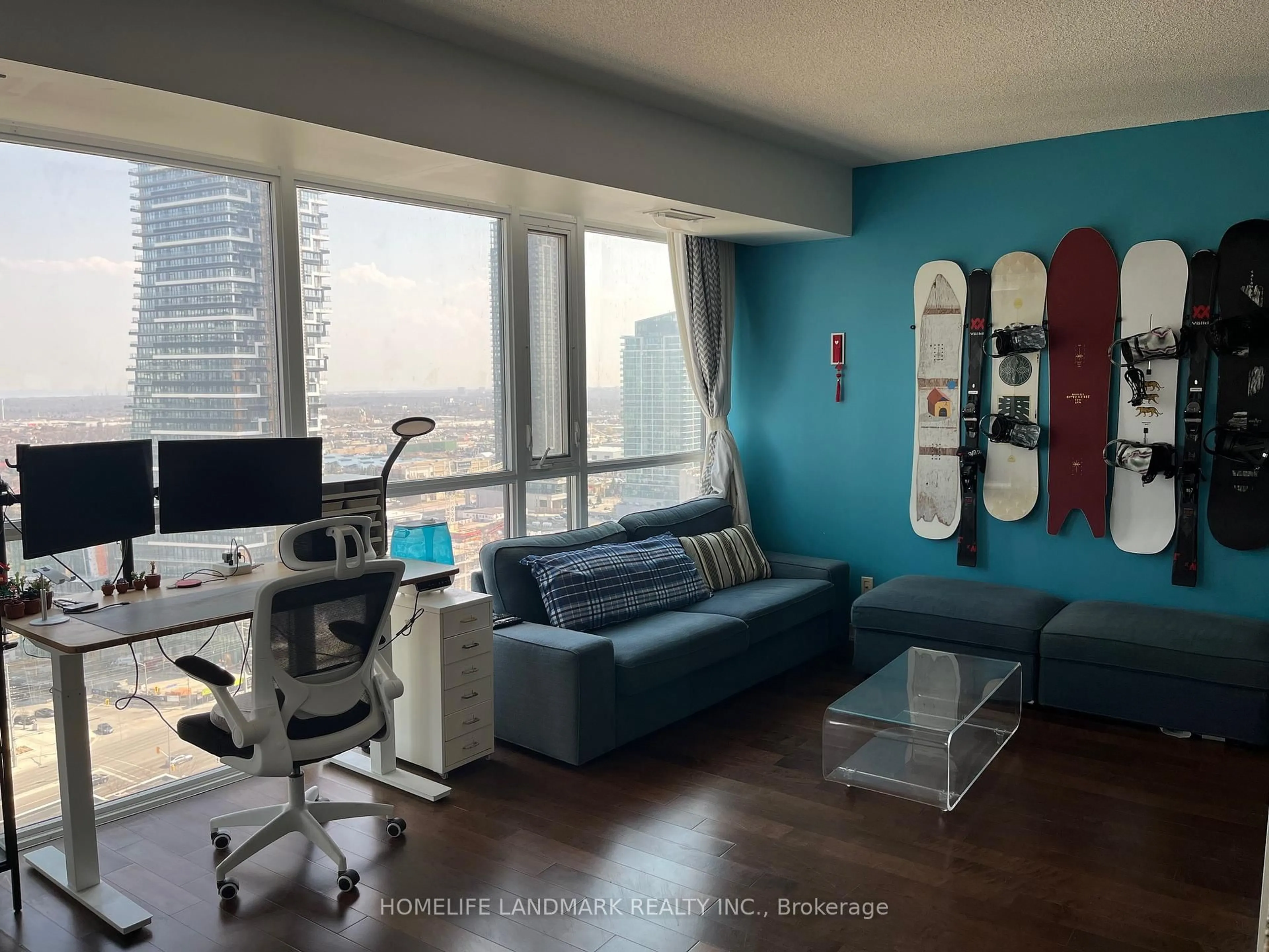 Living room with furniture, wood/laminate floor for 4065 Brickstone Mews #2203, Mississauga Ontario L5B 0G3