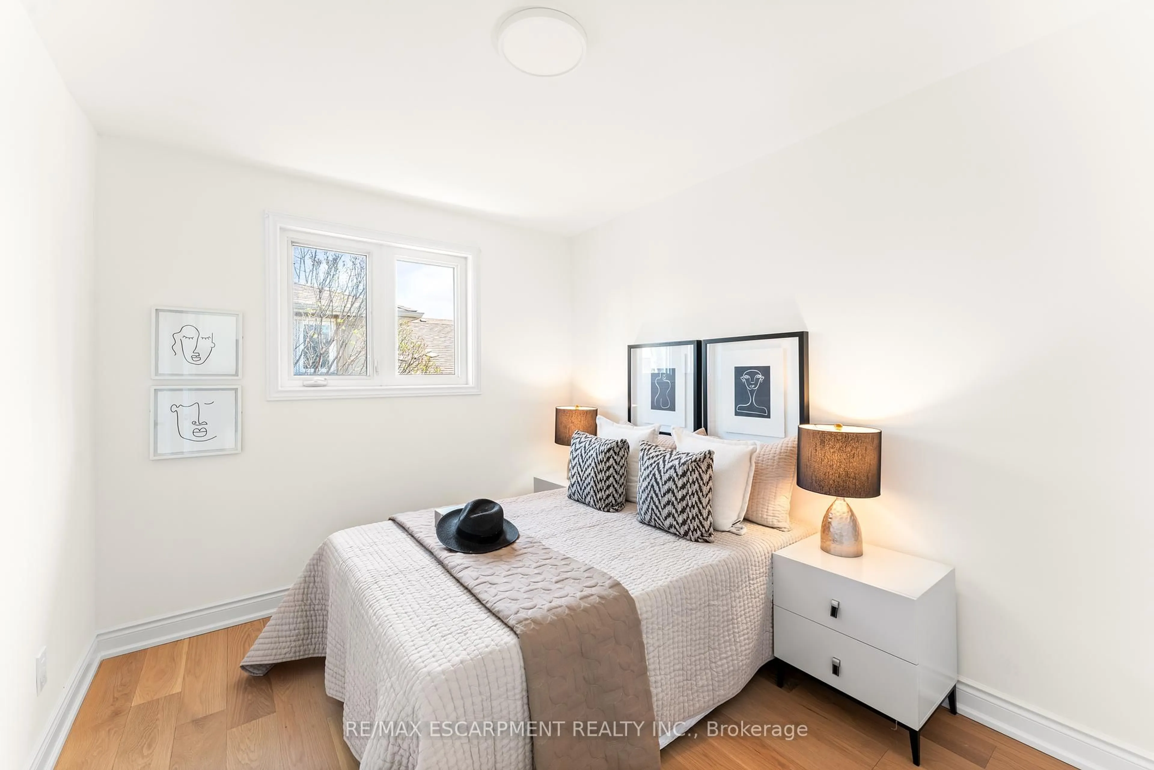 Bedroom with bed, wood/laminate floor for 3193 Cawthra Rd, Mississauga Ontario L5A 2X4