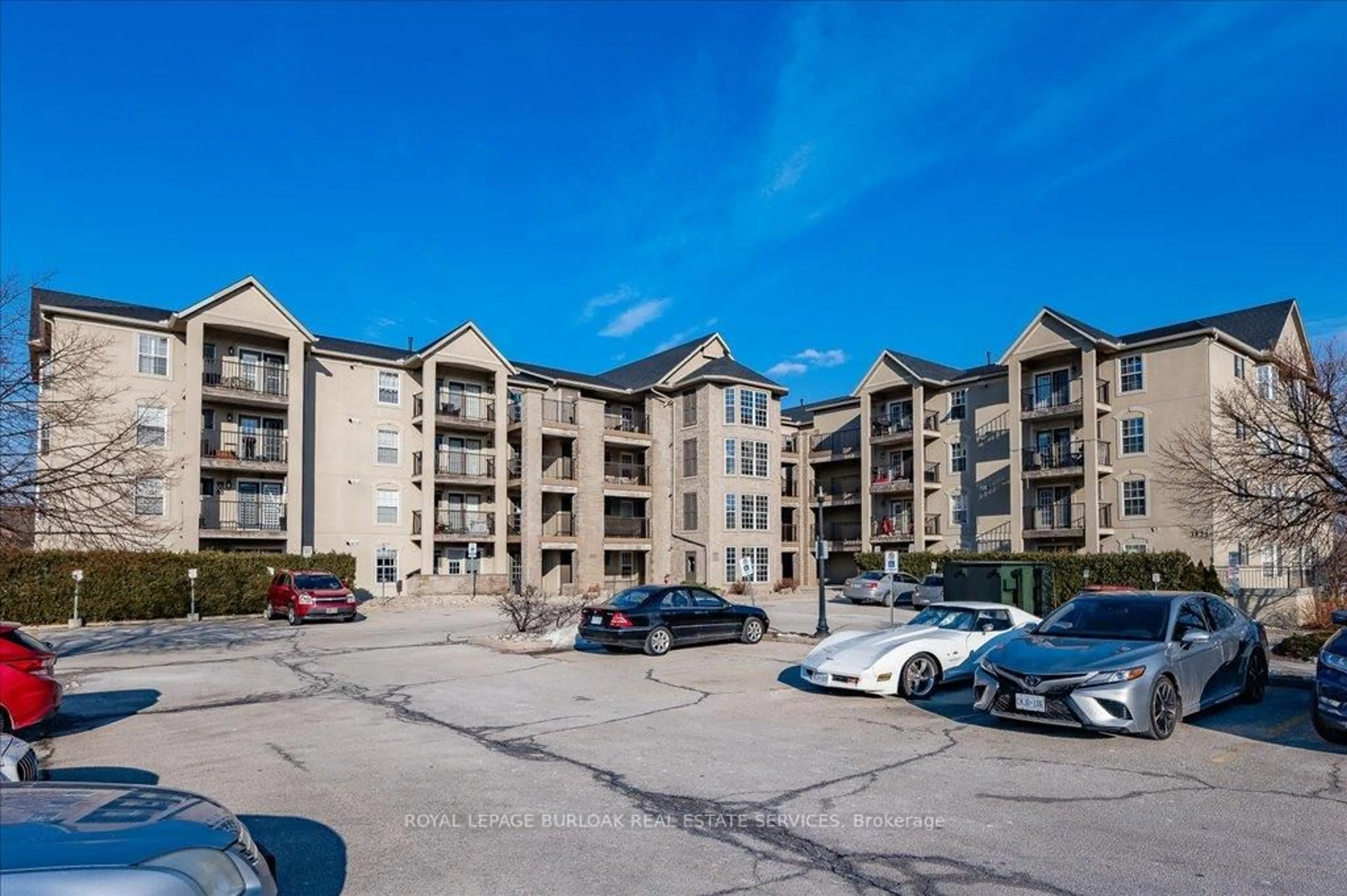 A pic from outside/outdoor area/front of a property/back of a property/a pic from drone, unknown for 1421 Walker's Line #211, Burlington Ontario L7M 4P4