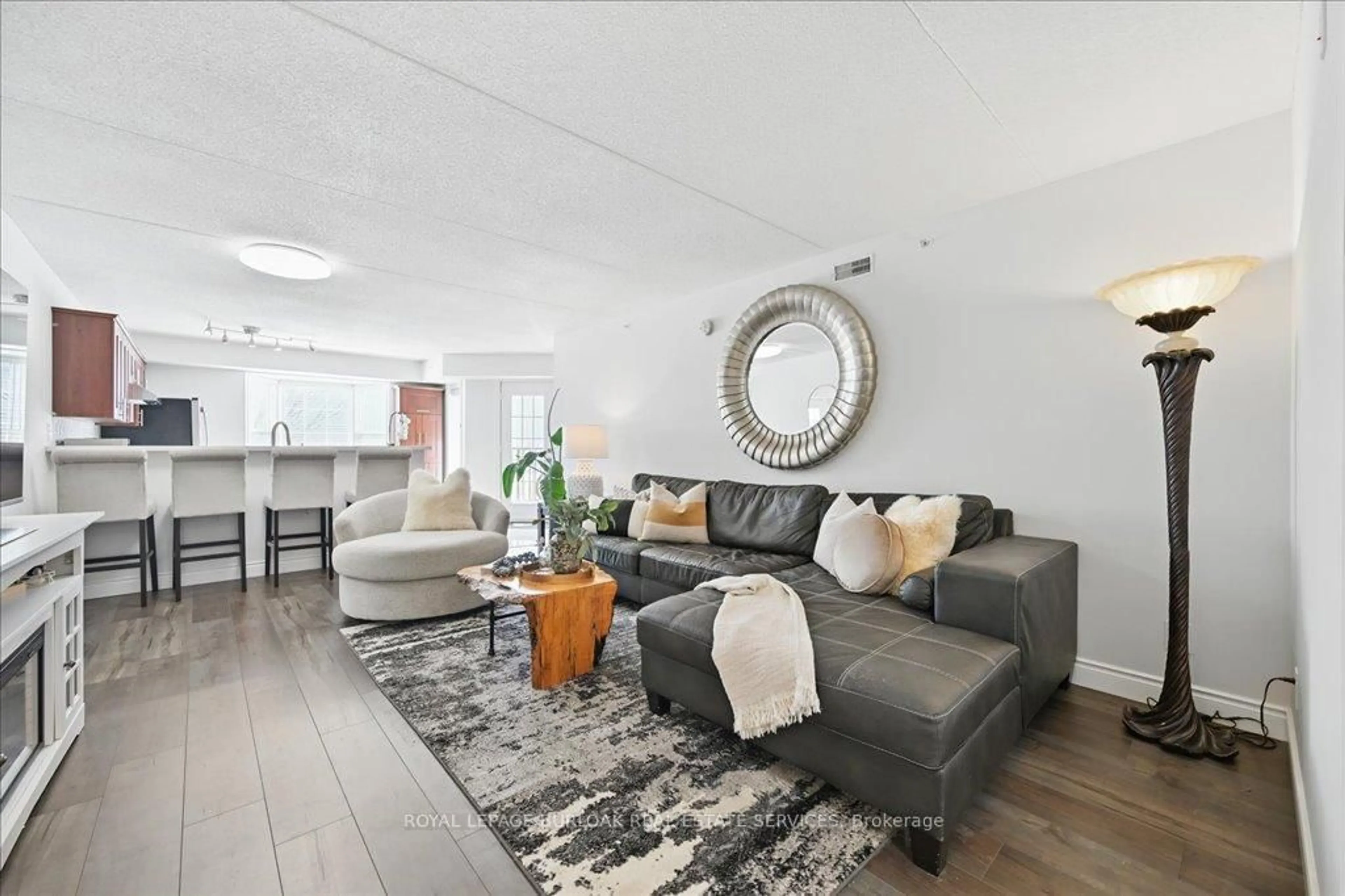 Living room with furniture, unknown for 1421 Walker's Line #211, Burlington Ontario L7M 4P4