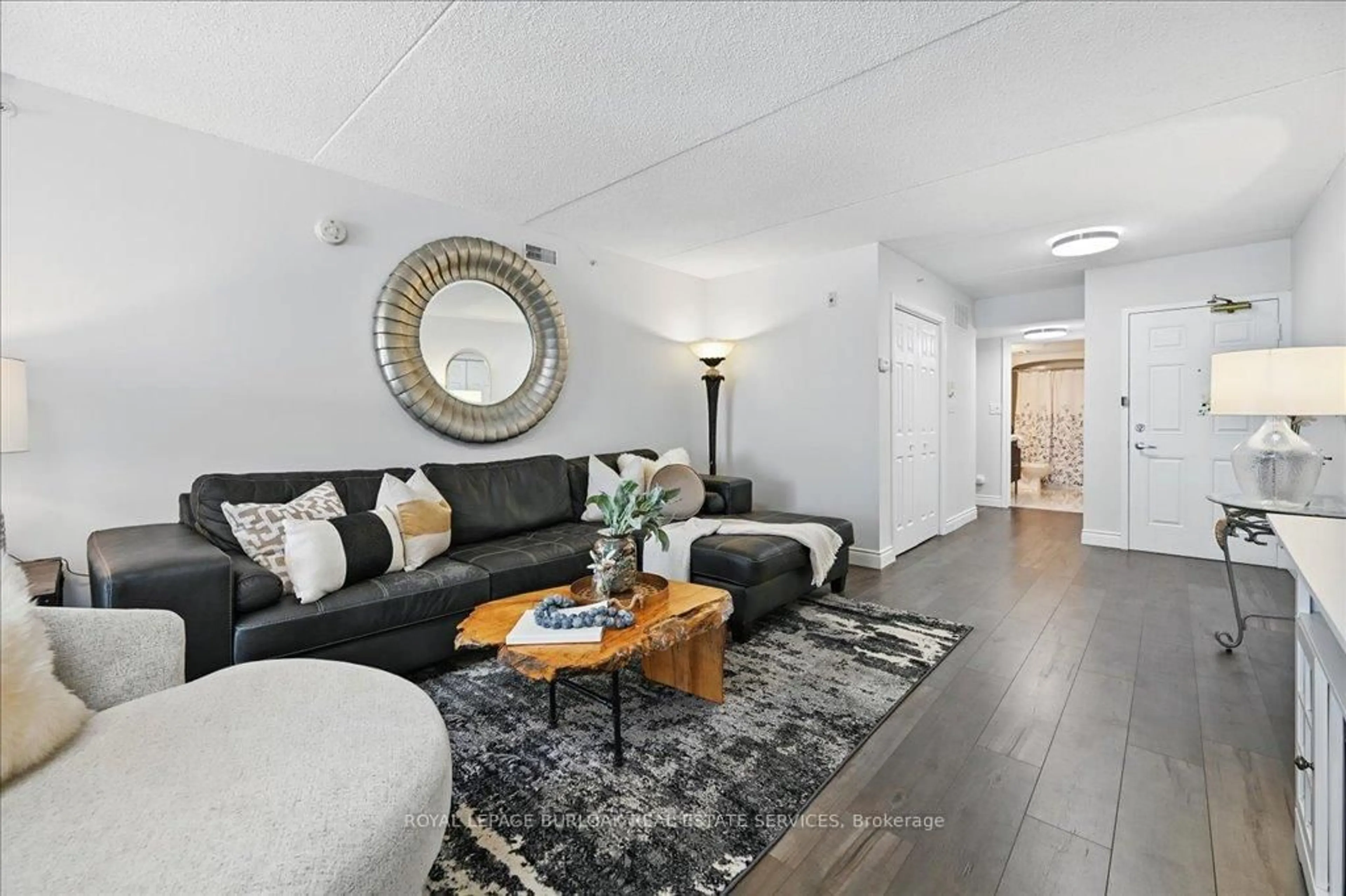 Living room with furniture, unknown for 1421 Walker's Line #211, Burlington Ontario L7M 4P4