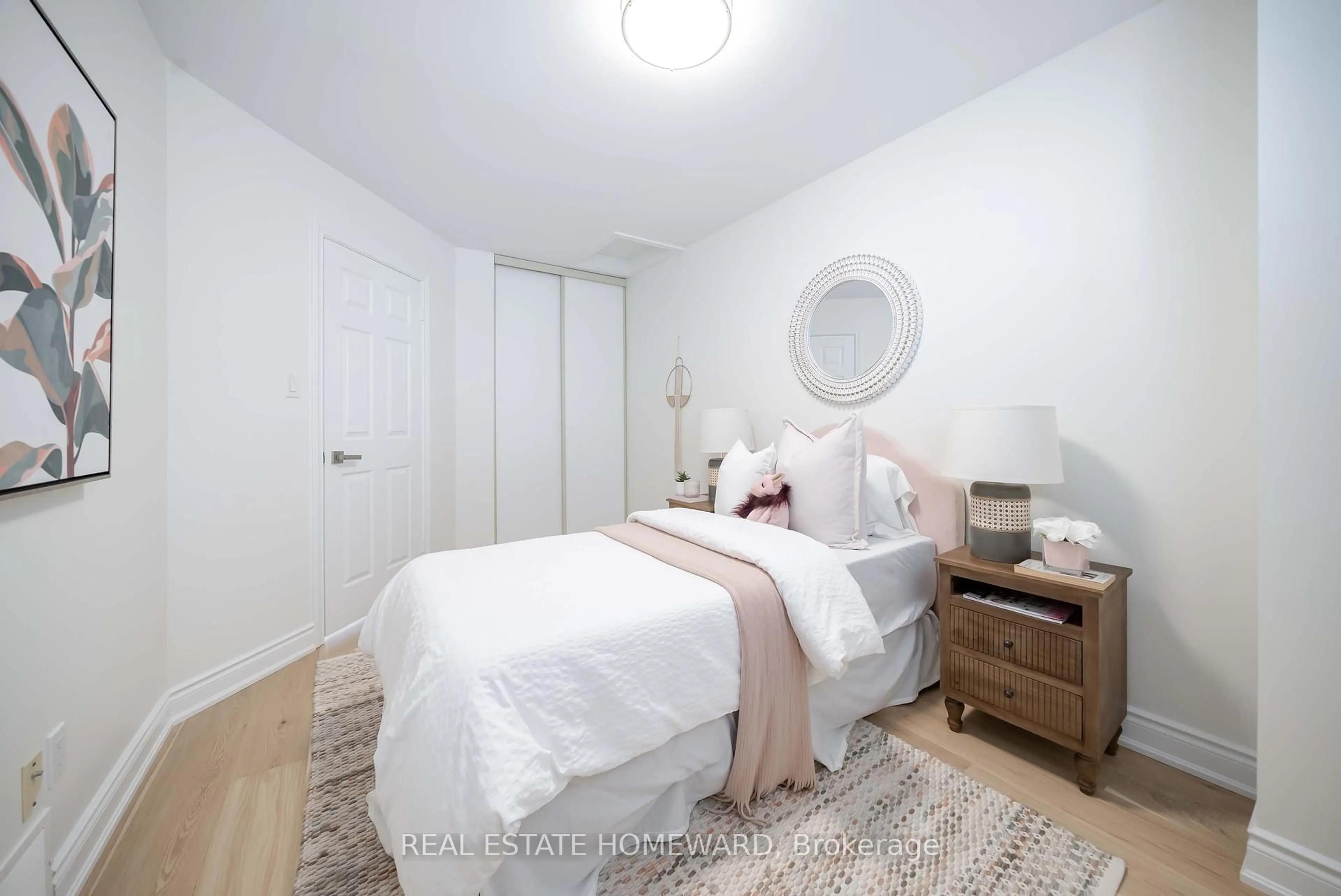 Bedroom with bed, wood/laminate floor for 2314 Marine Dr #2, Oakville Ontario L6L 1C3