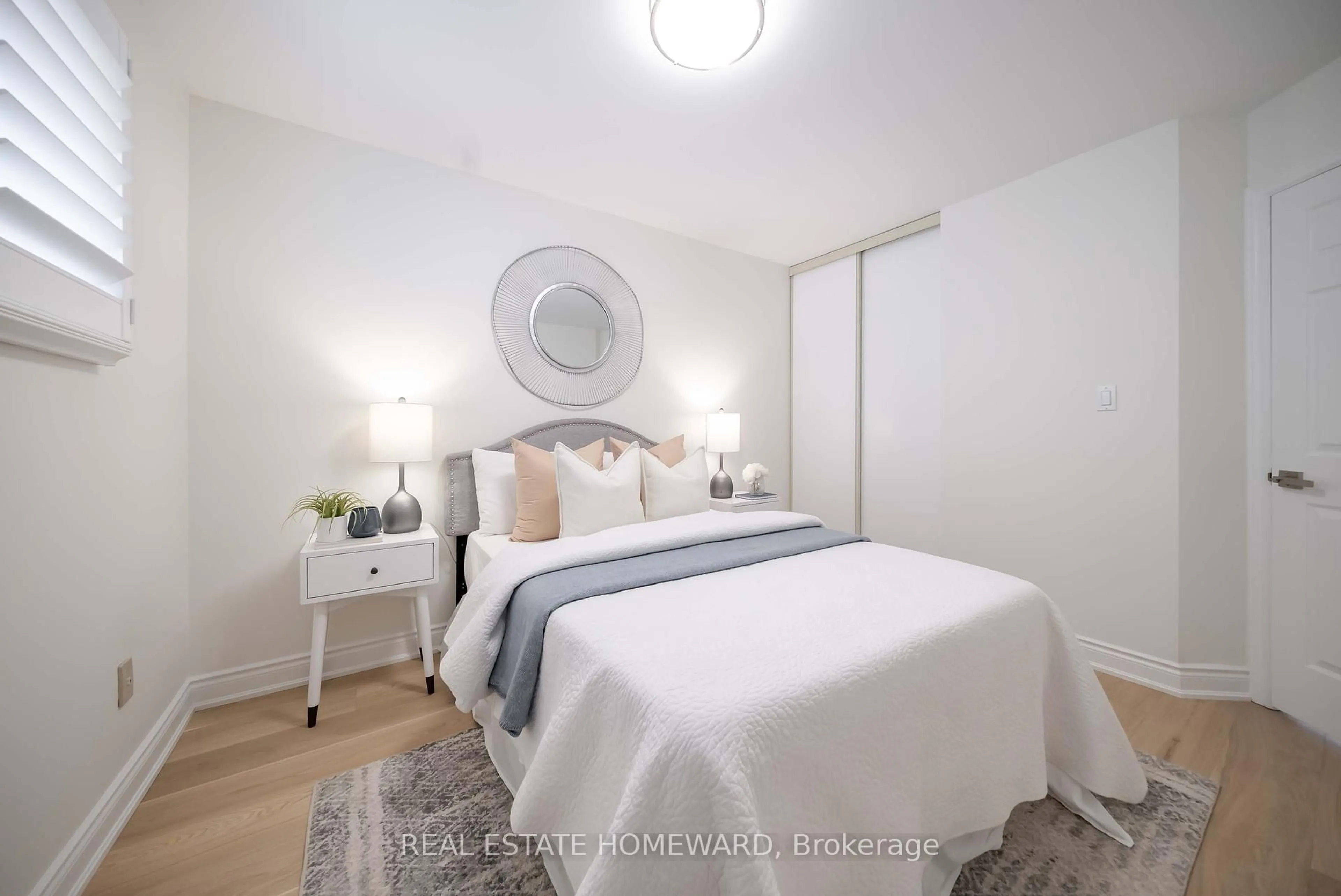Bedroom with bed, wood/laminate floor for 2314 Marine Dr #2, Oakville Ontario L6L 1C3