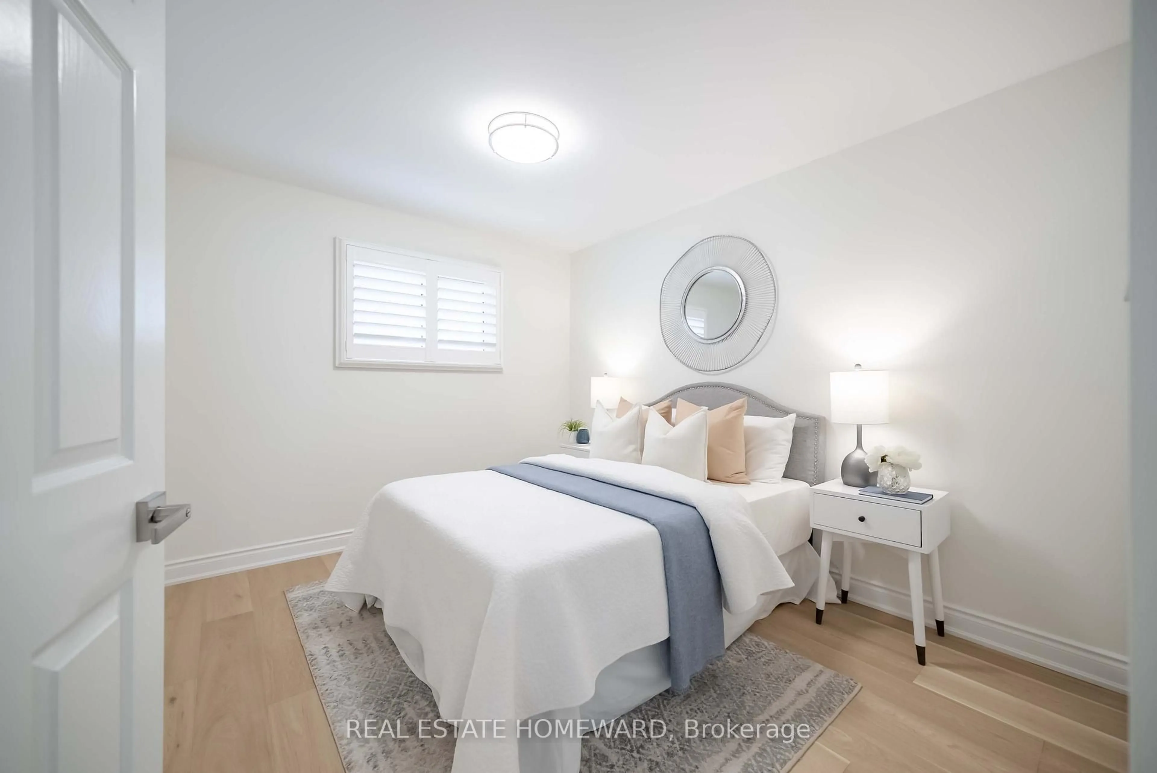 Bedroom with bed, wood/laminate floor for 2314 Marine Dr #2, Oakville Ontario L6L 1C3
