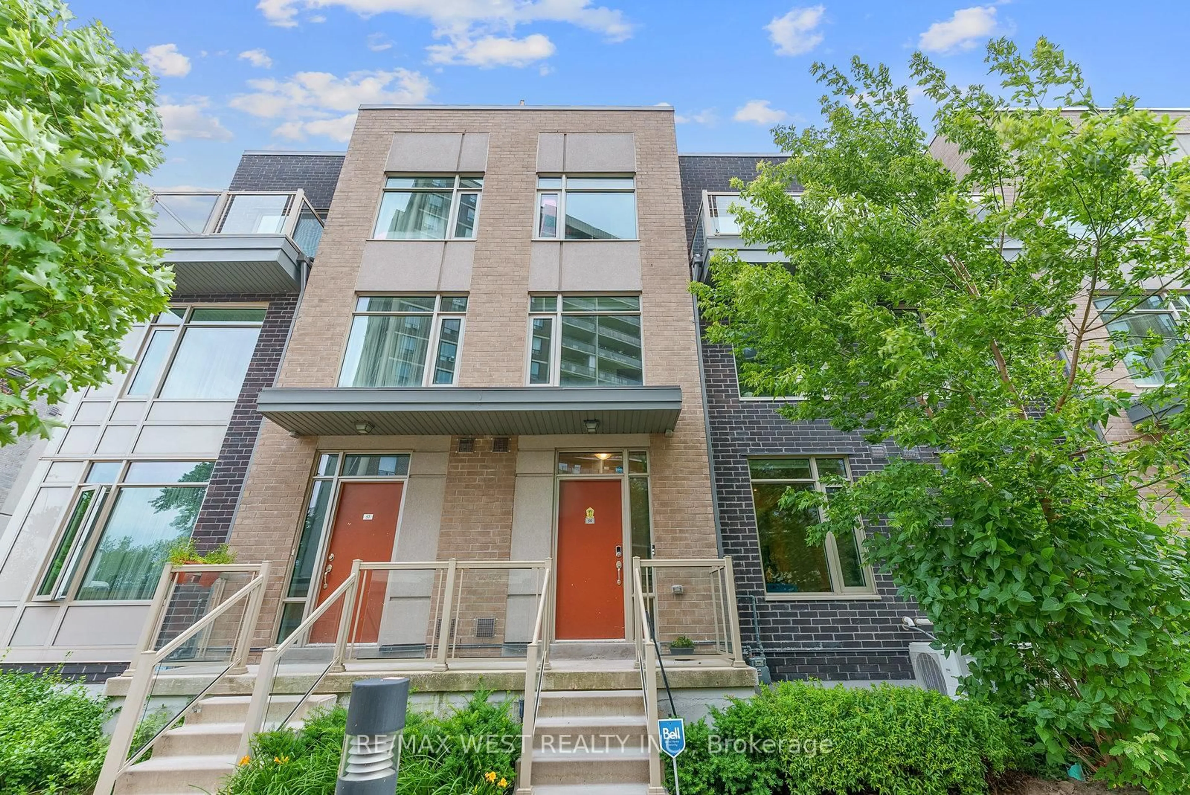Home with brick exterior material, street for 35 Applewood Lane #58, Toronto Ontario M9C 0C1