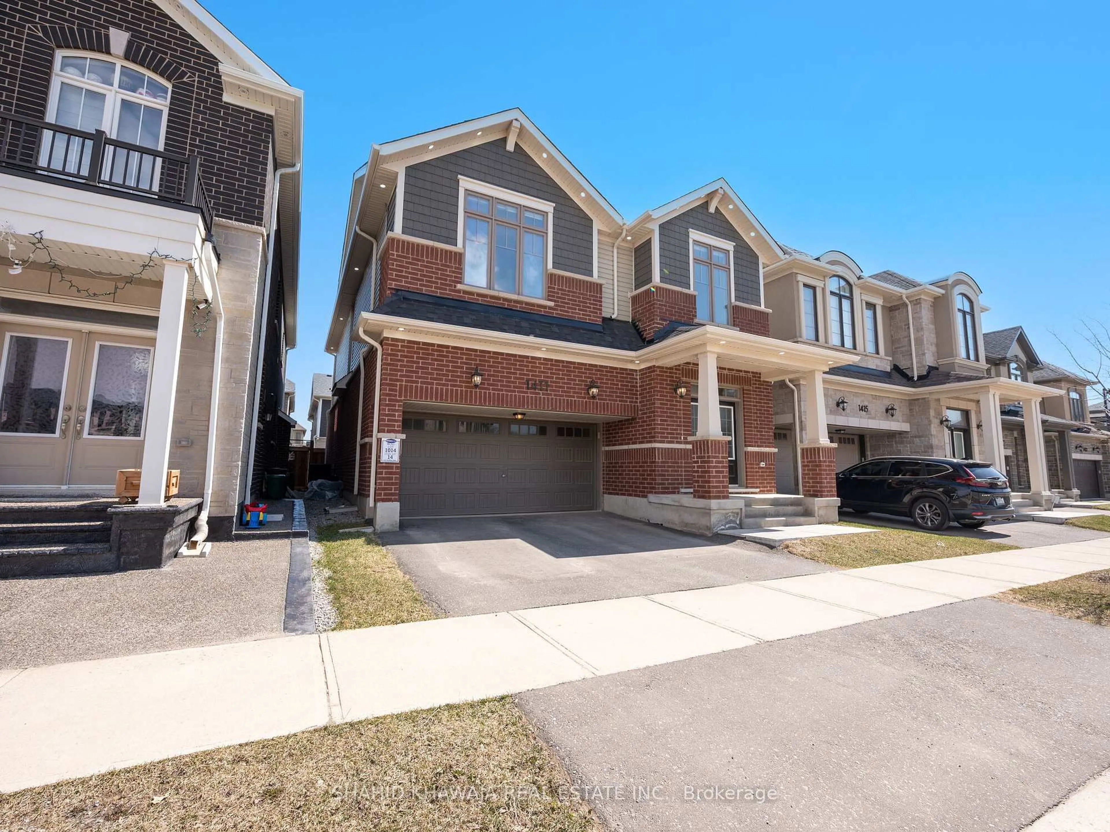 Home with brick exterior material, street for 1411 Buckthorn Gdns, Milton Ontario L9E 1P9