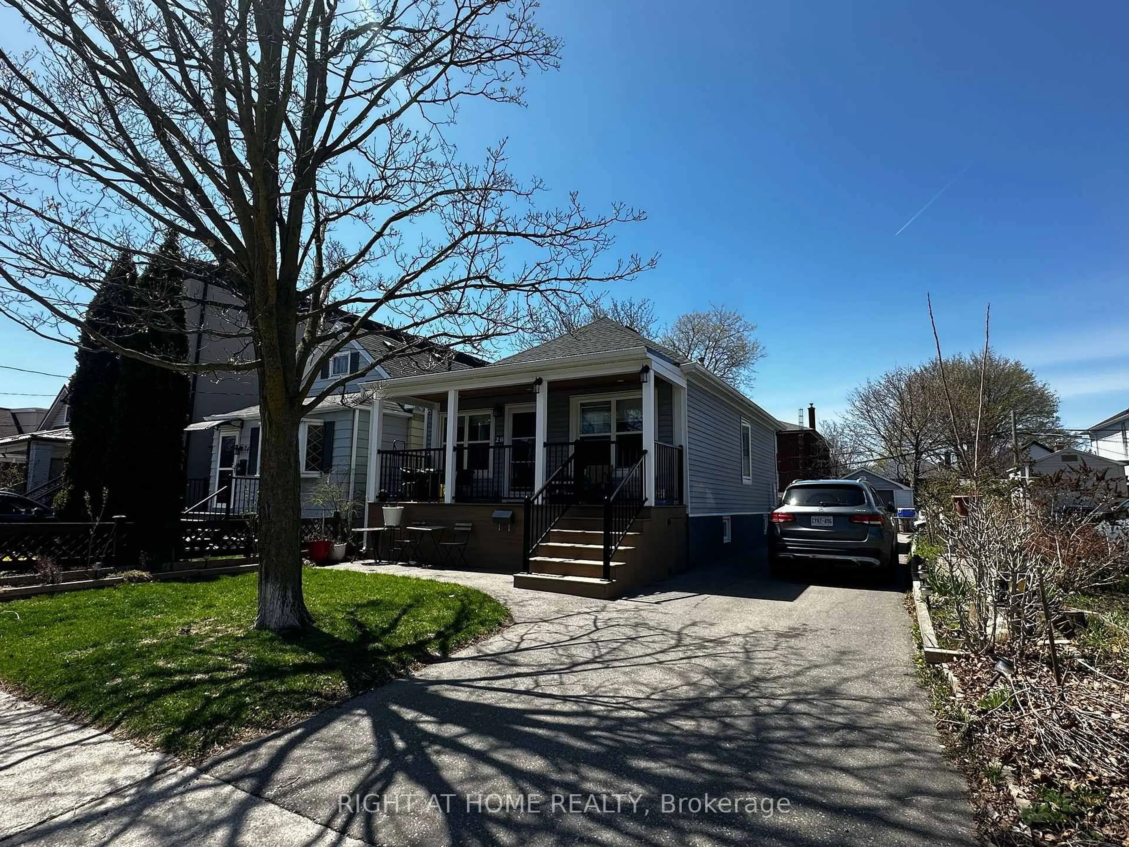 A pic from outside/outdoor area/front of a property/back of a property/a pic from drone, street for 26 Sixteenth St, Toronto Ontario M8V 3J8