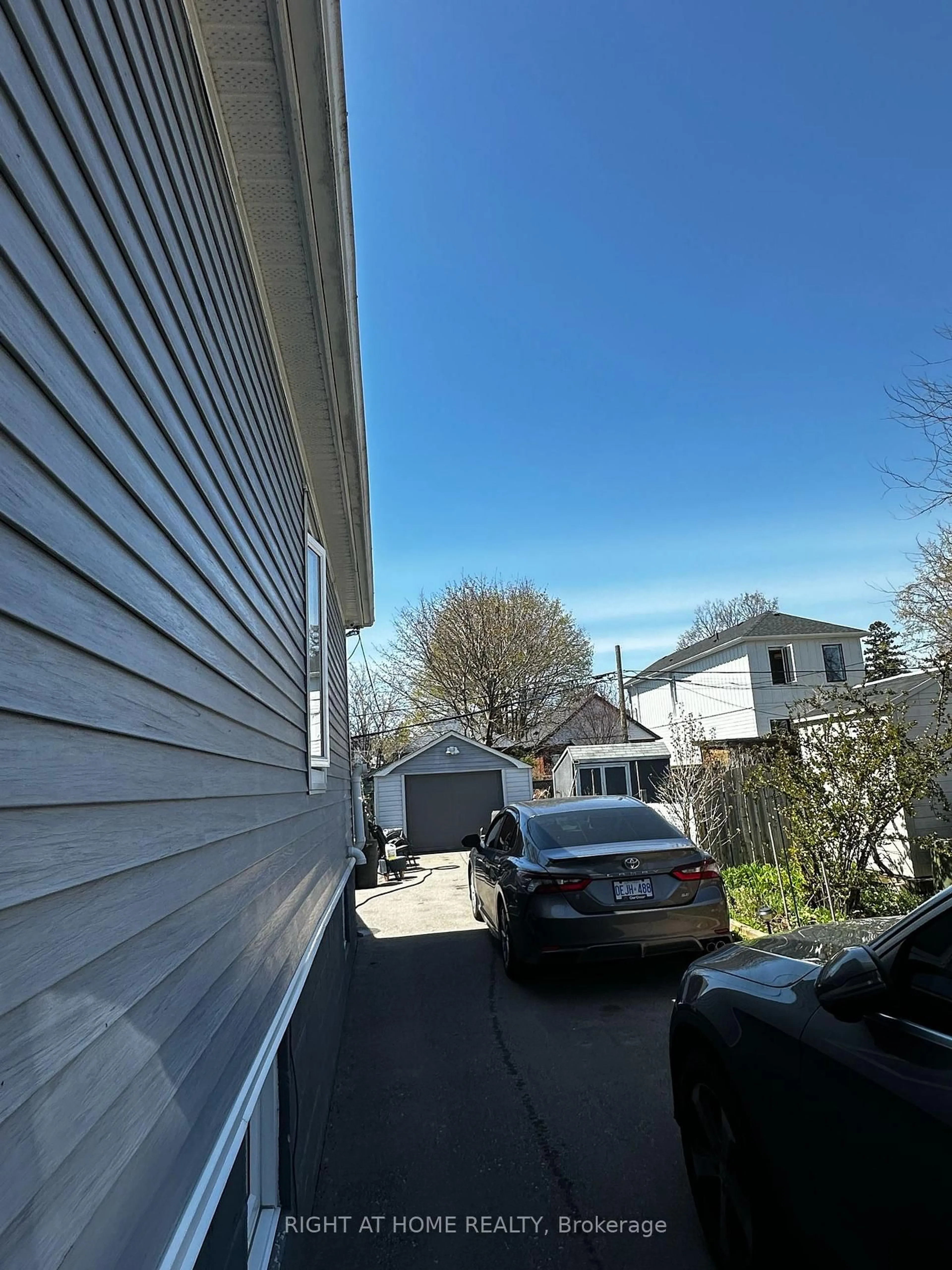 A pic from outside/outdoor area/front of a property/back of a property/a pic from drone, street for 26 Sixteenth St, Toronto Ontario M8V 3J8