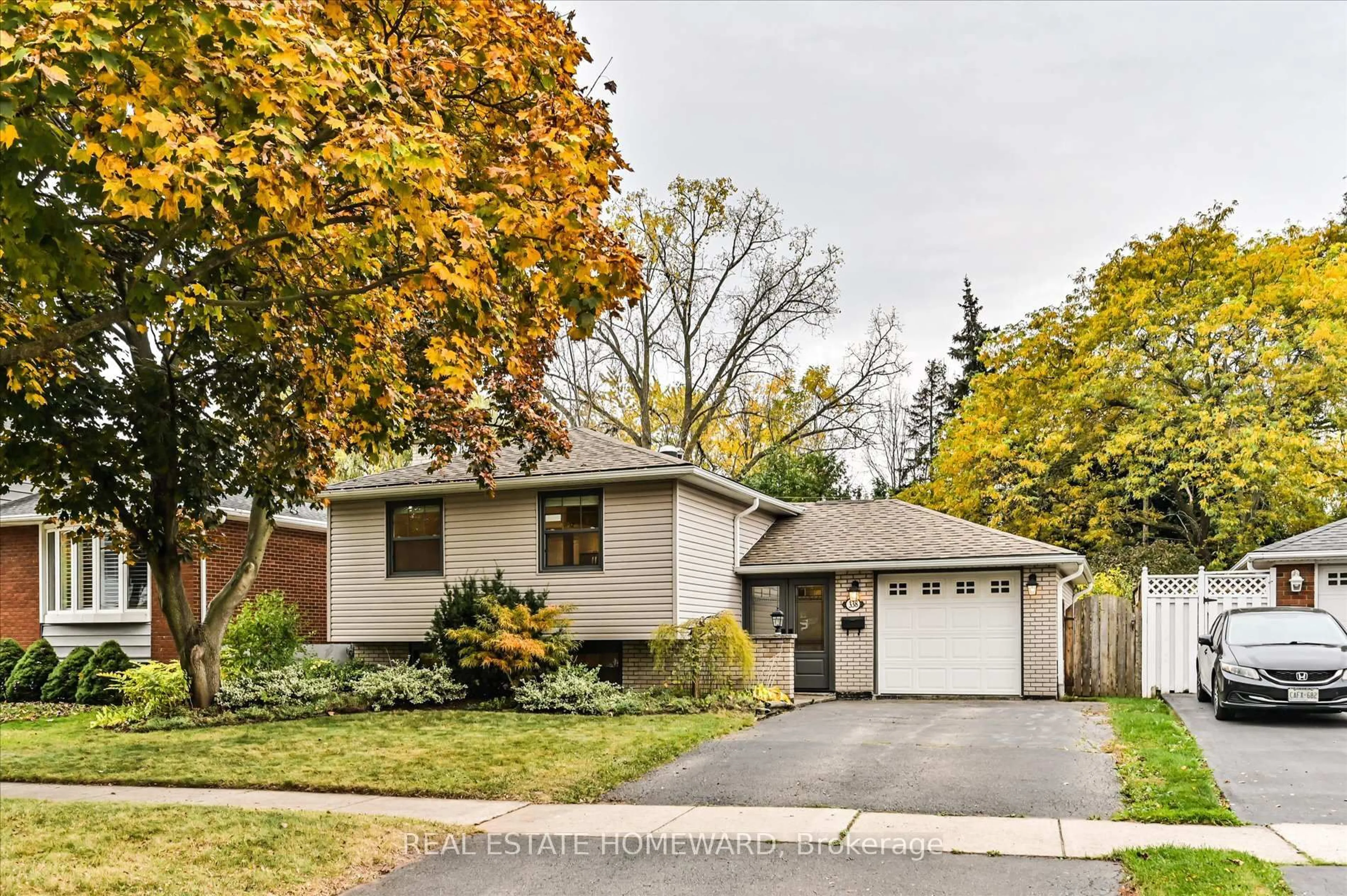 Home with brick exterior material, street for 338 Melores Dr, Burlington Ontario L7L 4T8