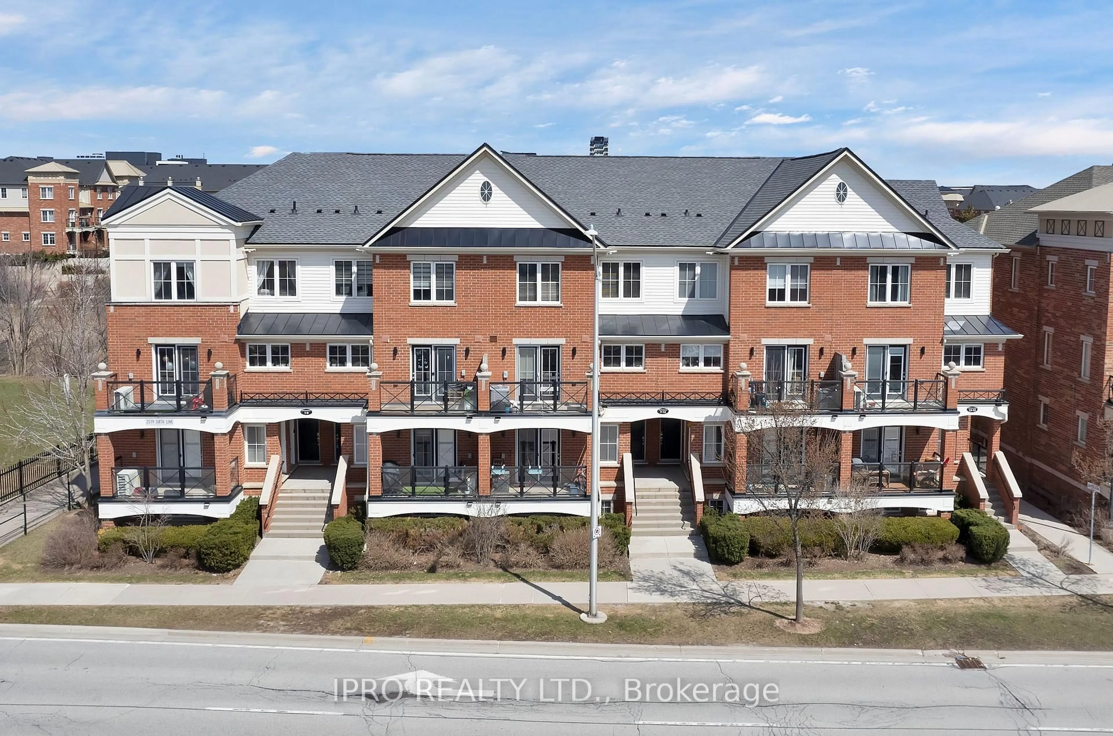 A pic from outside/outdoor area/front of a property/back of a property/a pic from drone, street for 2579 Sixth Line #Unit 3, Oakville Ontario L6H 0H7