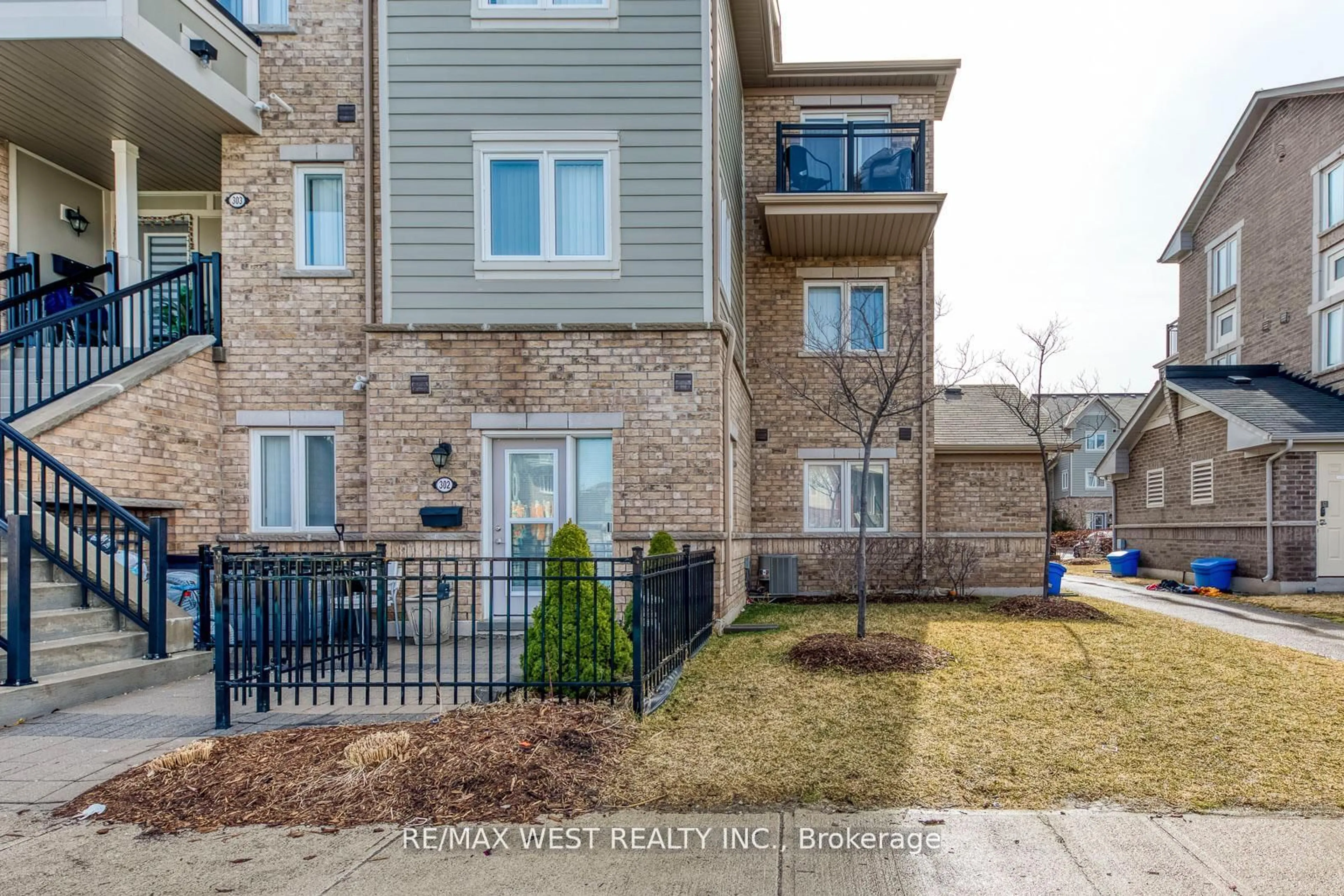 A pic from outside/outdoor area/front of a property/back of a property/a pic from drone, street for 250 Sunny Meadow Blvd #302, Brampton Ontario L6R 3Y6