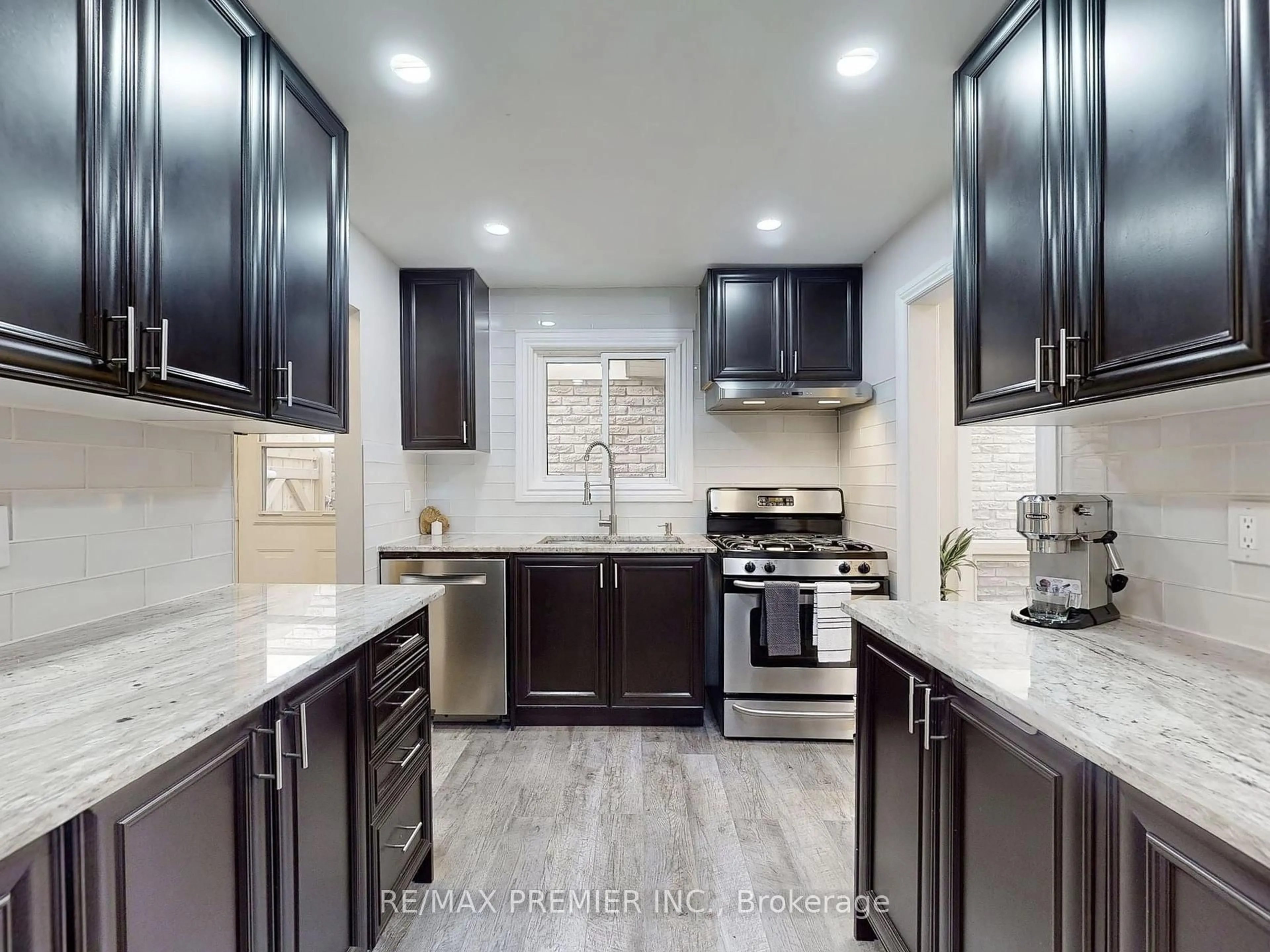 Contemporary kitchen, ceramic/tile floor for 2683 Romark Mews, Mississauga Ontario L5L 2Z4