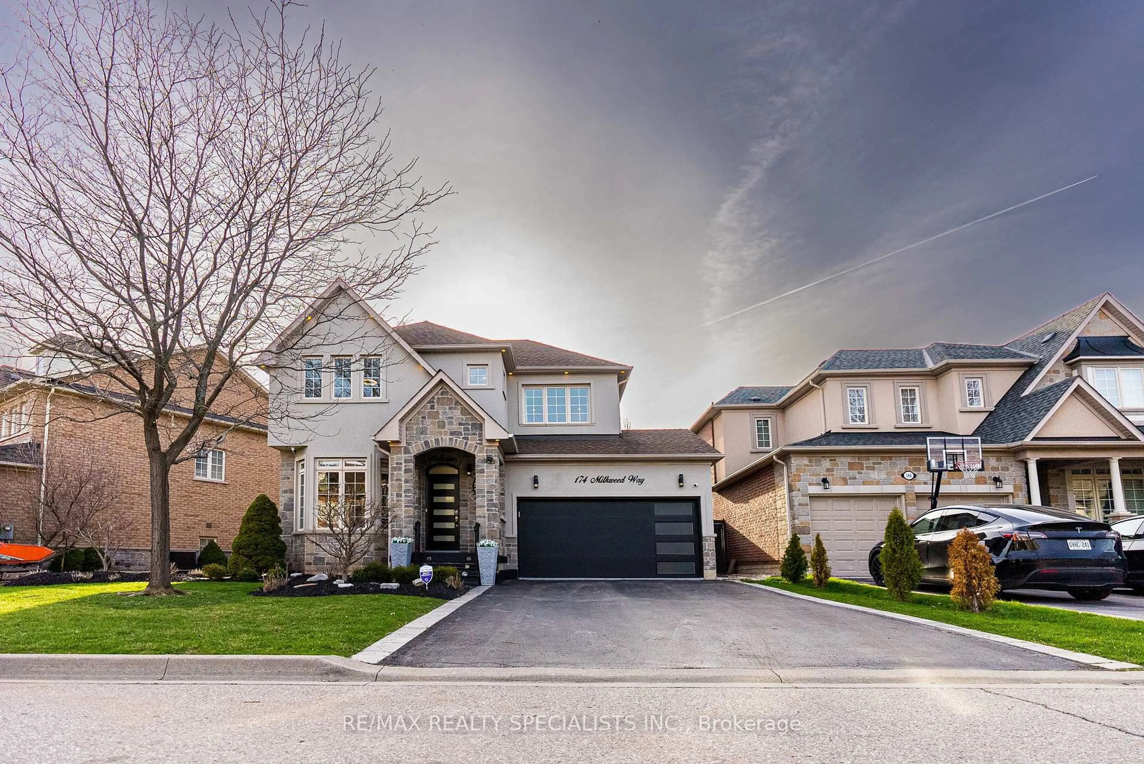 Home with brick exterior material, street for 174 Milkweed Way, Oakville Ontario L6L 0A4