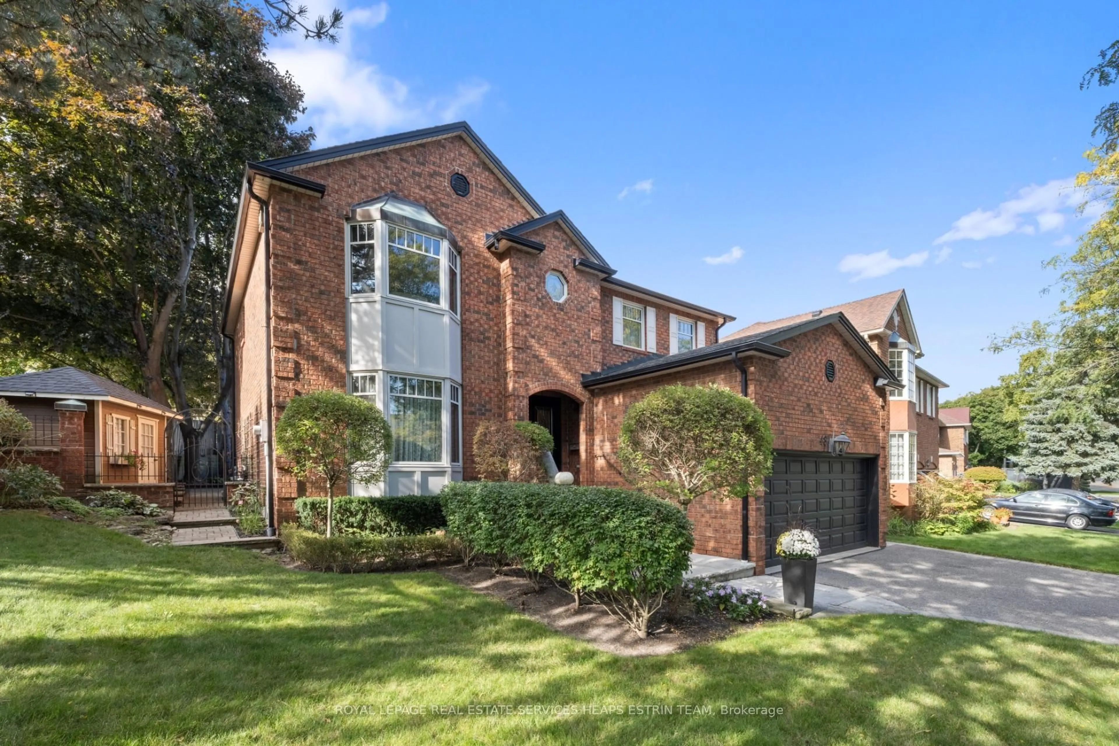 Home with brick exterior material, street for 48 Eden Valley Dr, Toronto Ontario M9A 4Z7