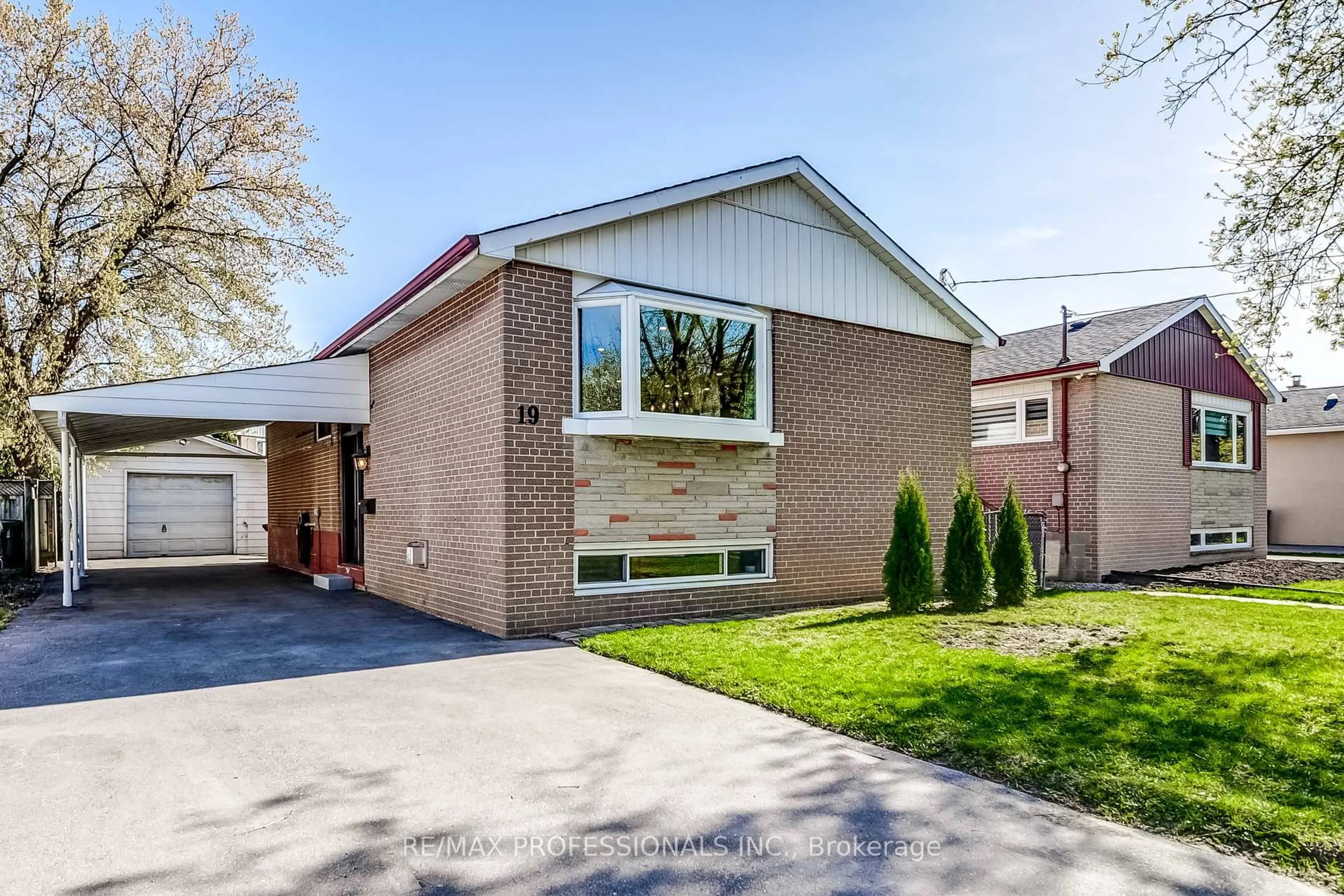 Home with brick exterior material, street for 19 Wellesworth Dr, Toronto Ontario M9C 4P5